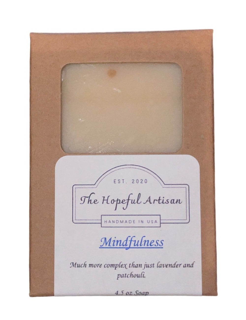 Mindfulness soap with lavender buds and floral accents, showcasing unique swirls and colors.