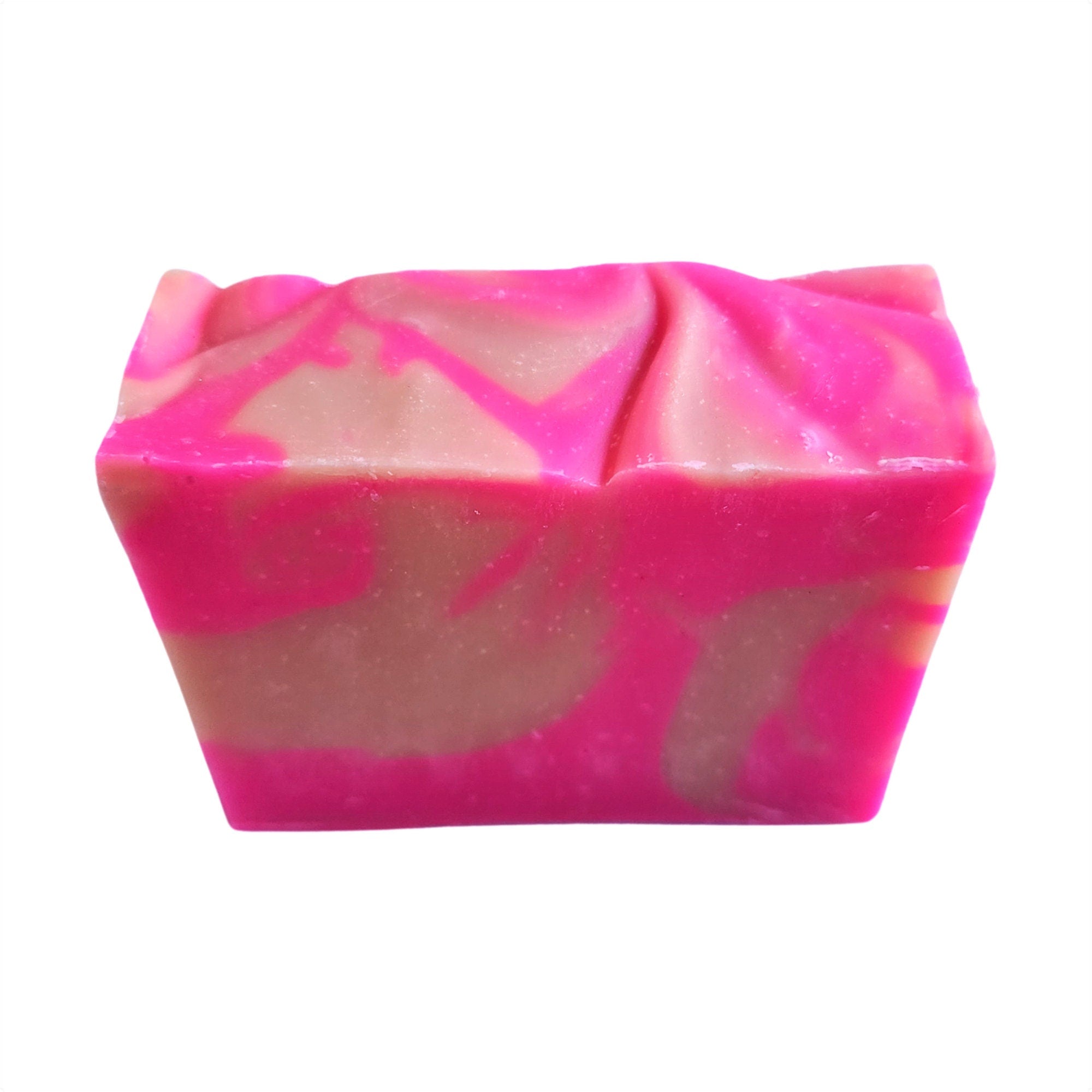 A vibrant Orange Blossom Soap bar with pink and orange swirls, showcasing its handcrafted design and tropical essence.