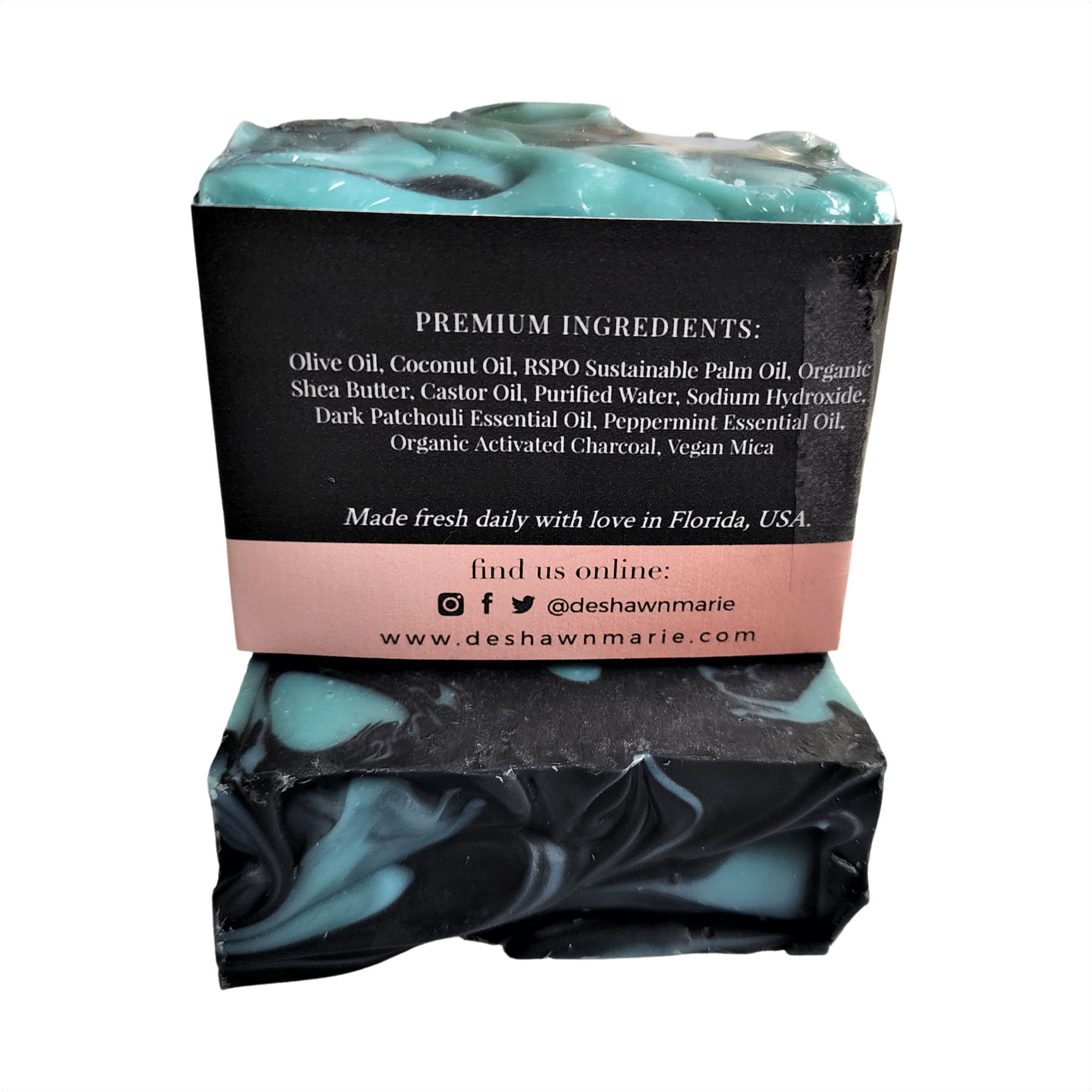 Patchouli Mint Soap bar with blue clay and activated charcoal, showcasing its rich texture and natural ingredients.