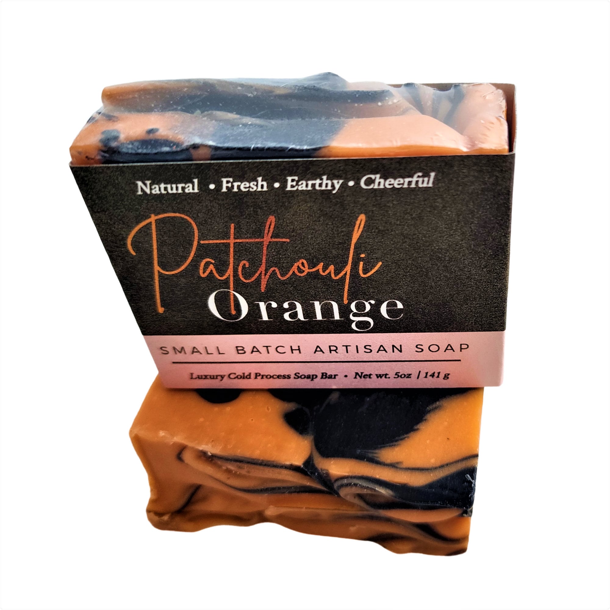 A beautifully crafted Patchouli Orange Soap bar, showcasing its earthy brown and vibrant orange colors, wrapped elegantly for a luxurious touch.