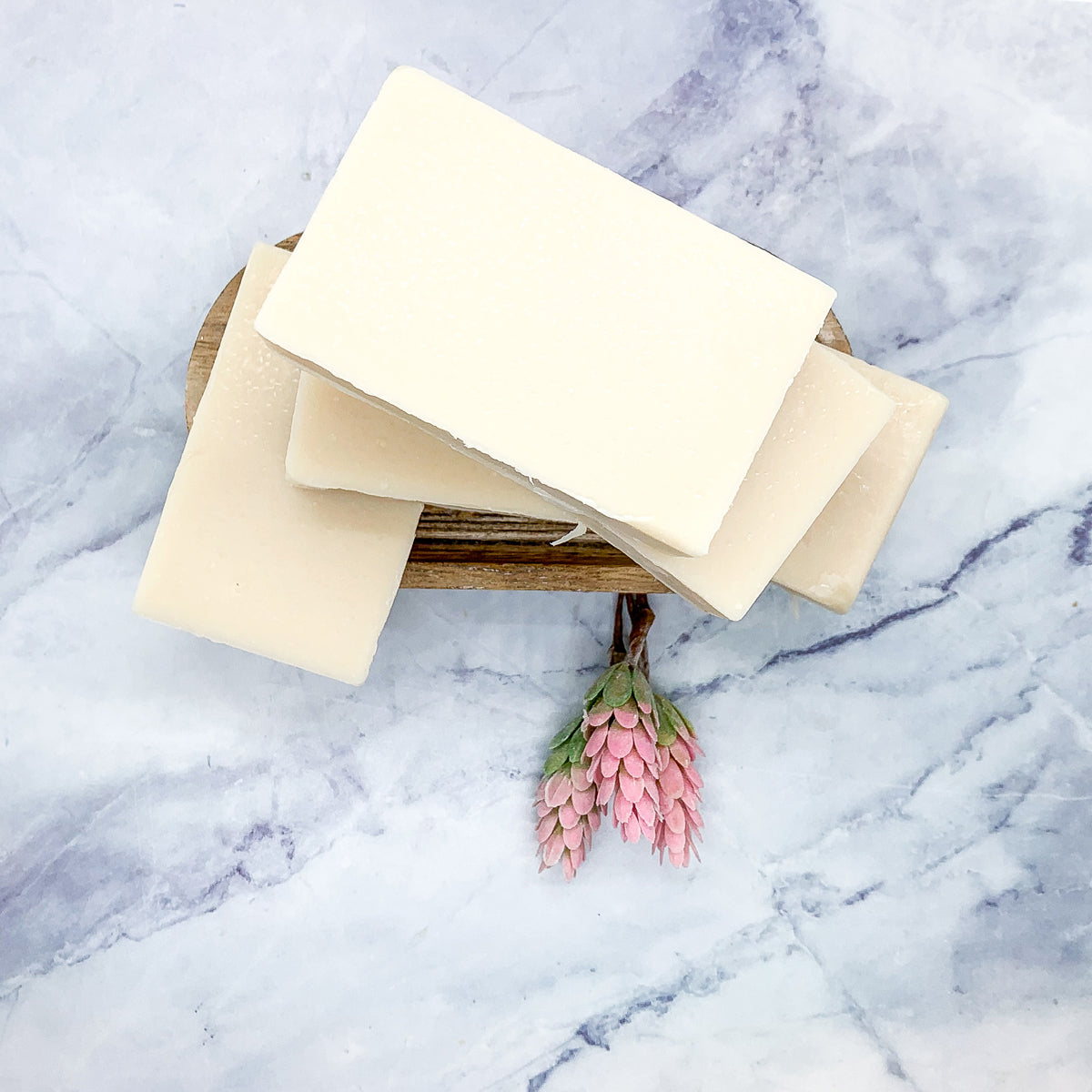 A vibrant Pearberry soap bar showcasing a blend of fruity colors, handcrafted with organic ingredients.