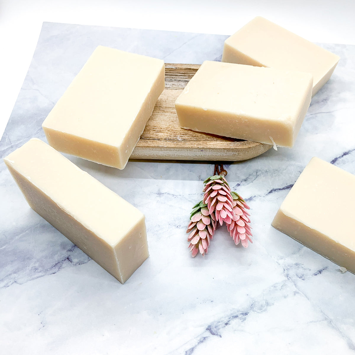 A vibrant Pearberry soap bar showcasing a blend of fruity colors, handcrafted with organic ingredients.