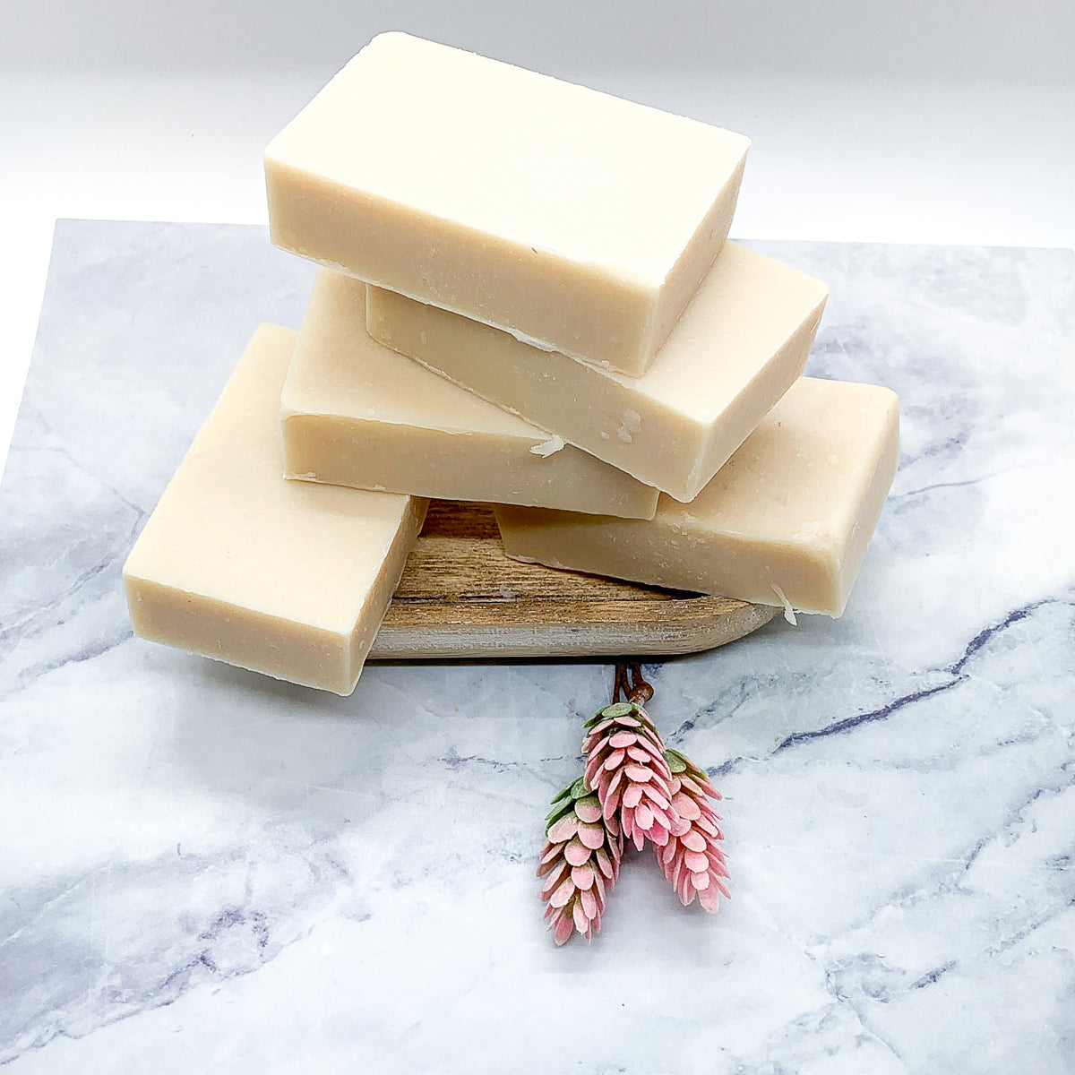 A vibrant Pearberry soap bar showcasing a blend of fruity colors, handcrafted with organic ingredients.