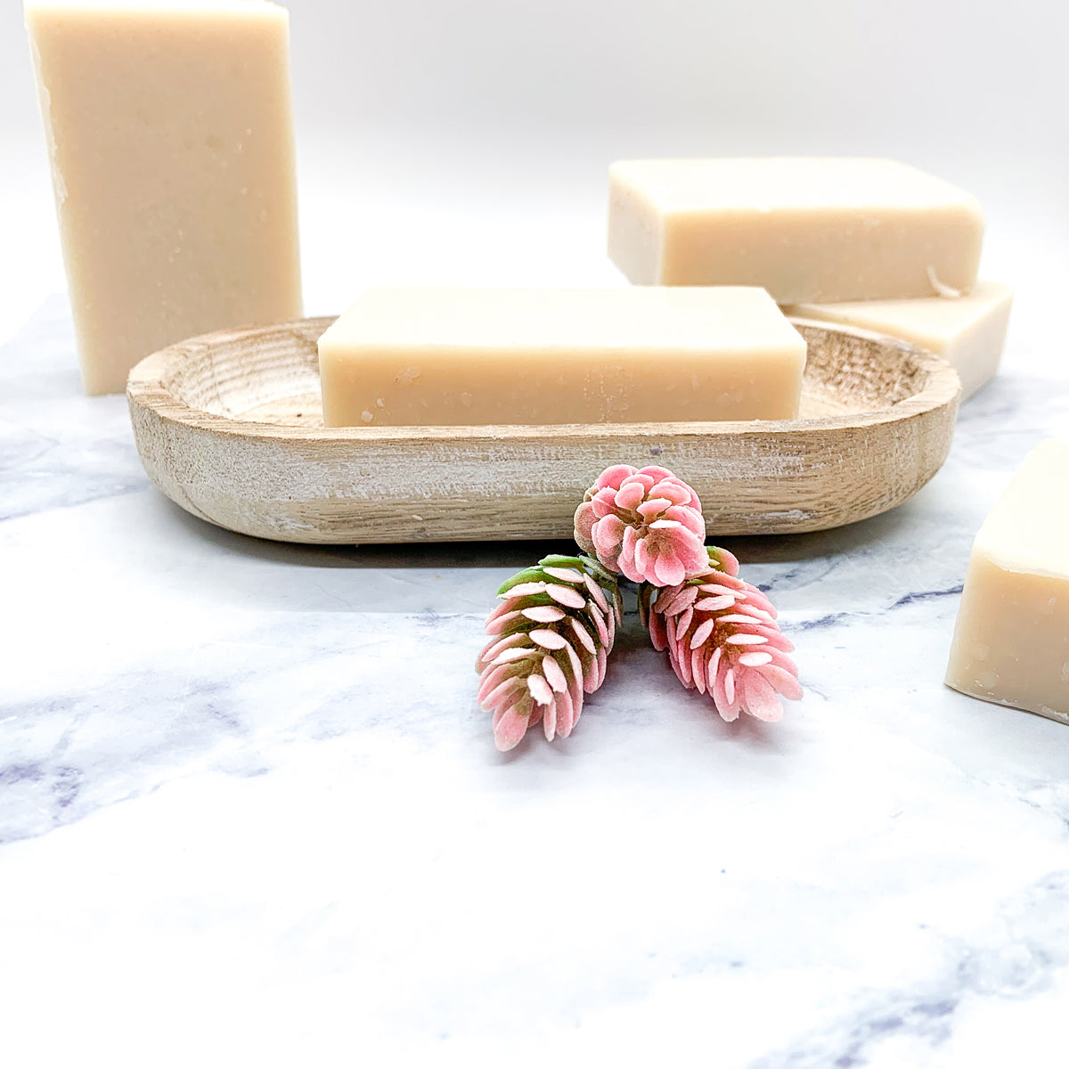 A vibrant Pearberry soap bar showcasing a blend of fruity colors, handcrafted with organic ingredients.