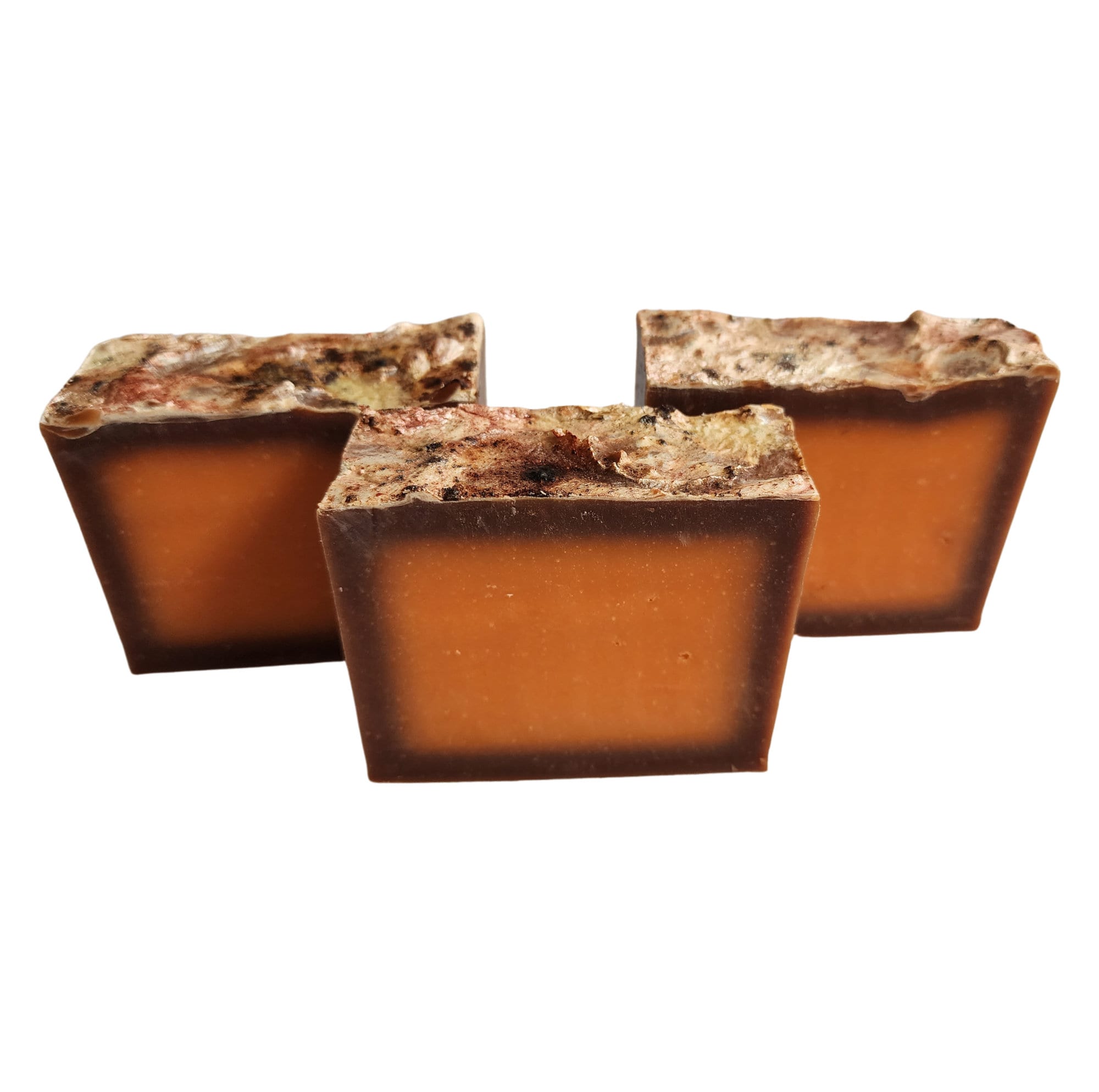 A beautifully crafted Pumpkin Spice Latte Soap bar with warm autumn colors and spices, perfect for a cozy shower experience.