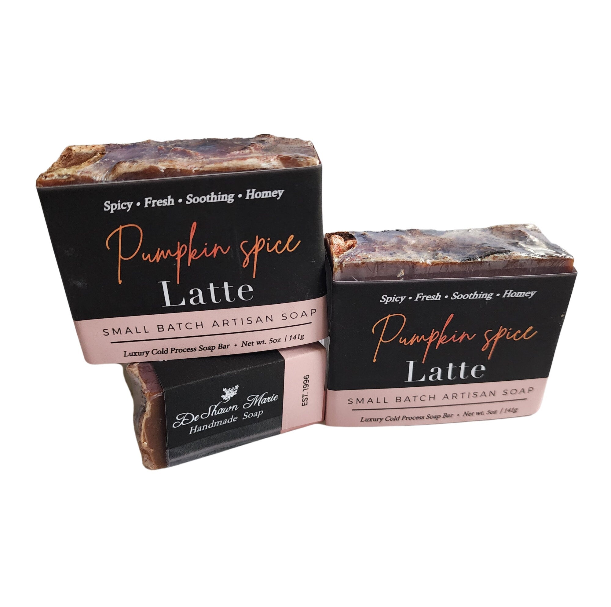 A beautifully crafted Pumpkin Spice Latte Soap bar with warm autumn colors and spices, perfect for a cozy shower experience.