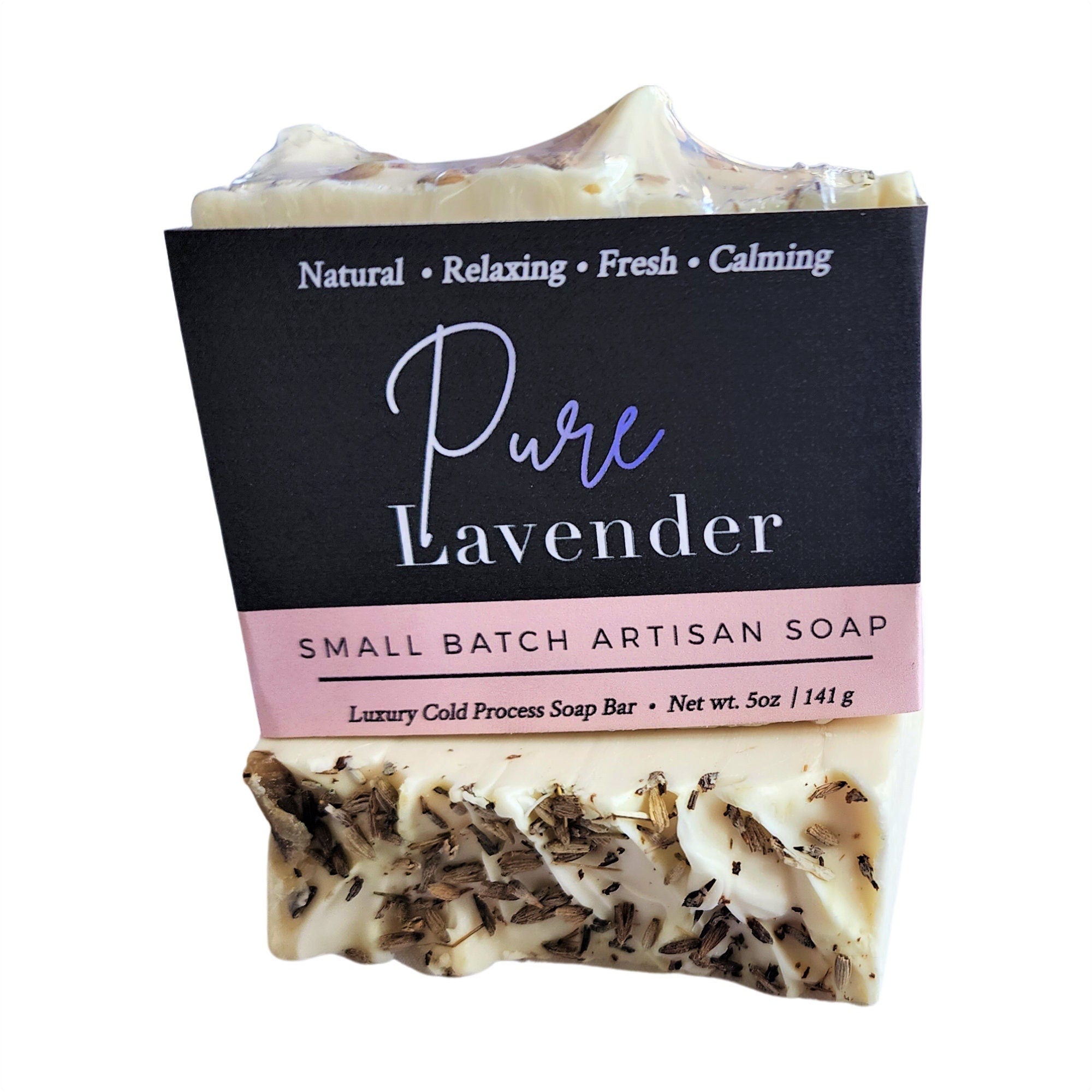 A beautifully crafted Pure Lavender Soap bar with lavender buds on top, showcasing its rich texture and vibrant color.