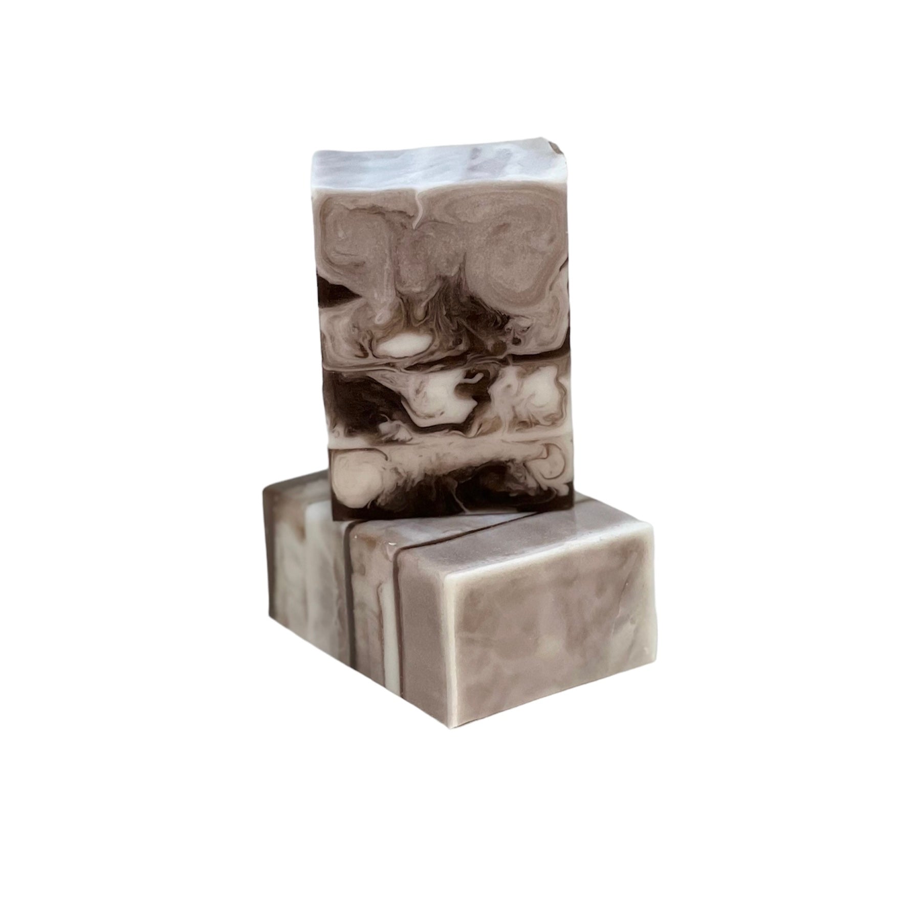 Pure Mahogany Unisex Soap Bar with rich brown and white swirls, showcasing its natural ingredients and luxurious design.