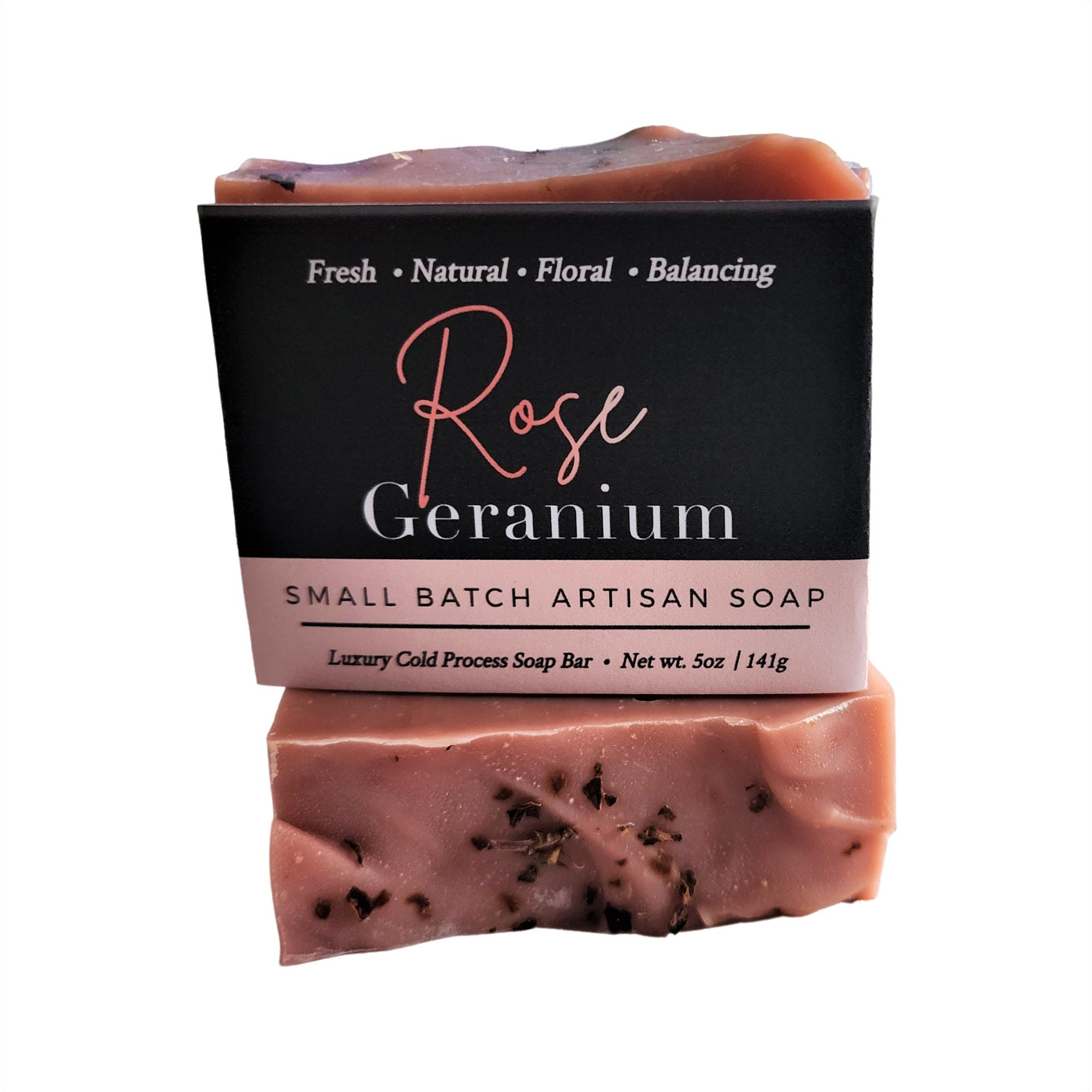 A beautifully crafted Rose Geranium Soap bar with pink clay and crushed rose petals, showcasing its delicate texture and vibrant color.