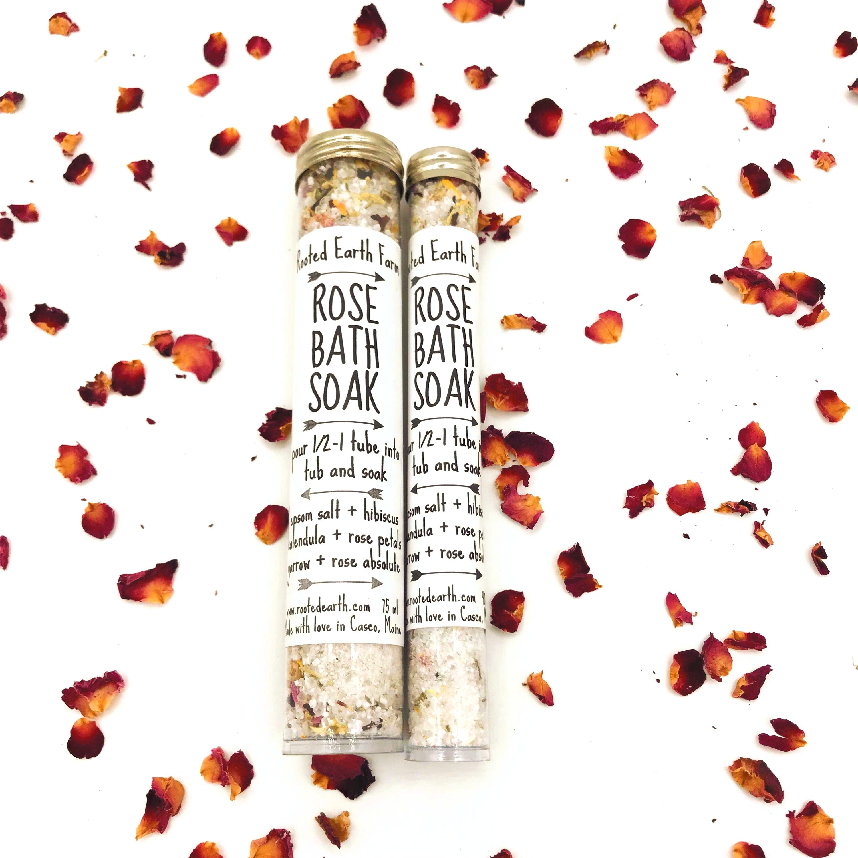 A 75 ml tube of Rose Natural Bath Soak featuring organic rose petals, yarrow, and hibiscus for a soothing bath experience.