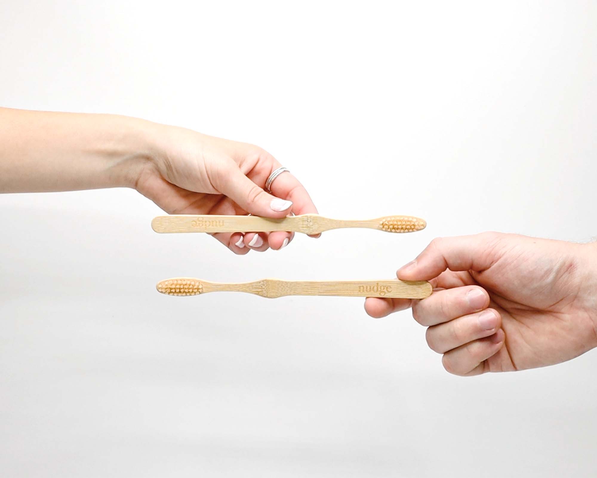 A pack of two soft bristles sustainable bamboo toothbrushes with a natural bamboo handle and soft bristles.