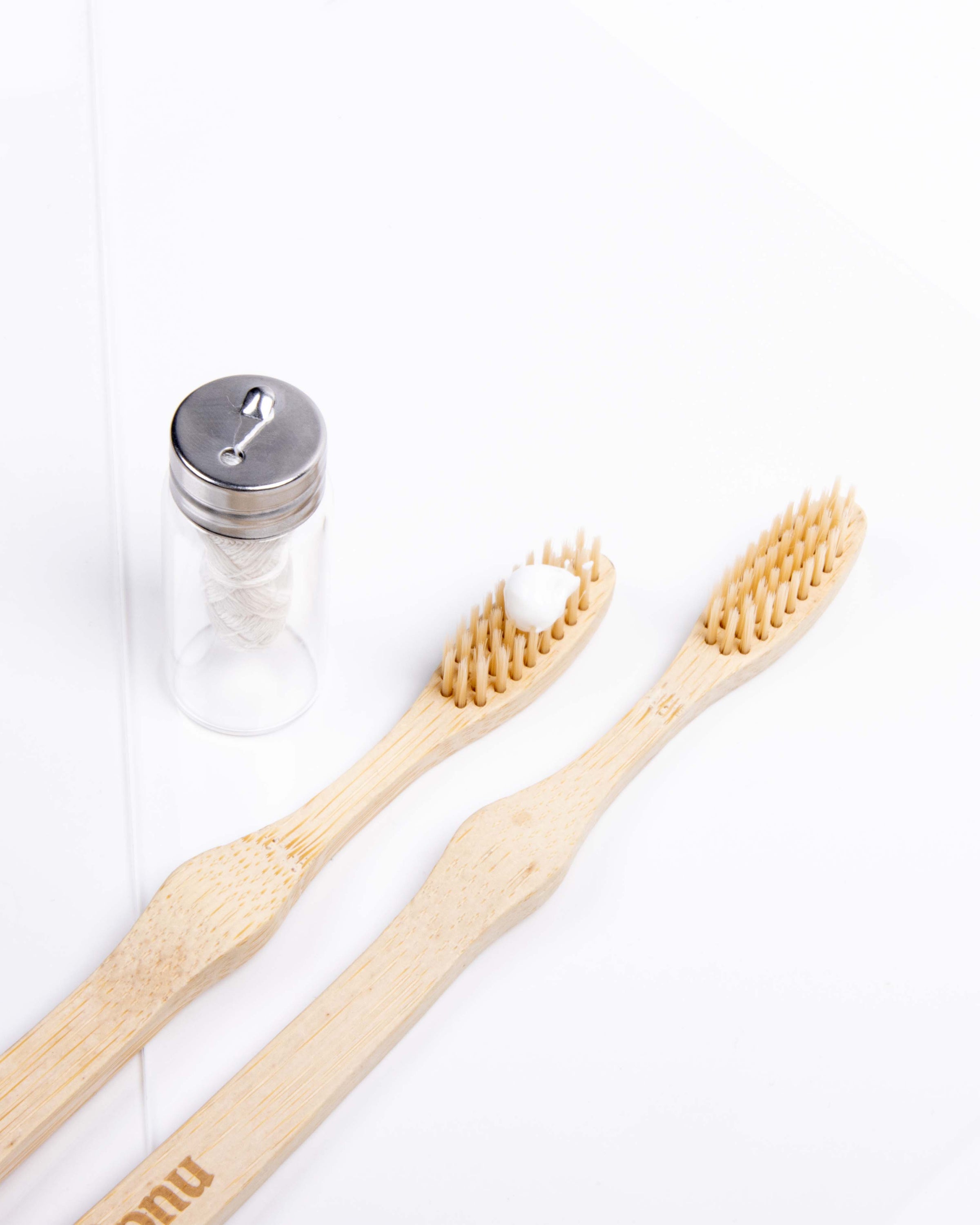 A pack of two soft bristles sustainable bamboo toothbrushes with a natural bamboo handle and soft bristles.