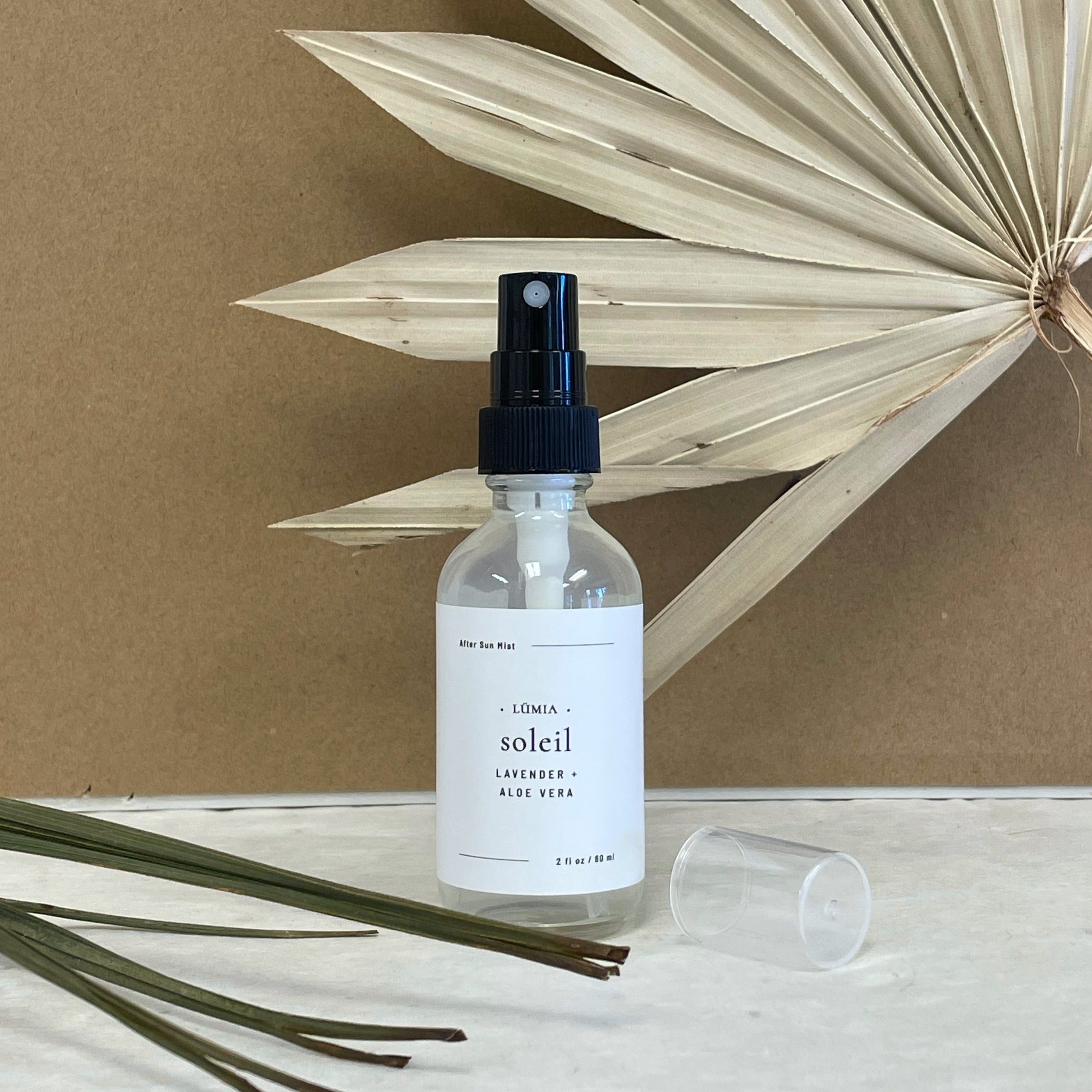 Soleil After Sun Mist bottle with a refreshing blend of Aloe Vera, Lavender, and Peppermint for soothing sun-exposed skin.