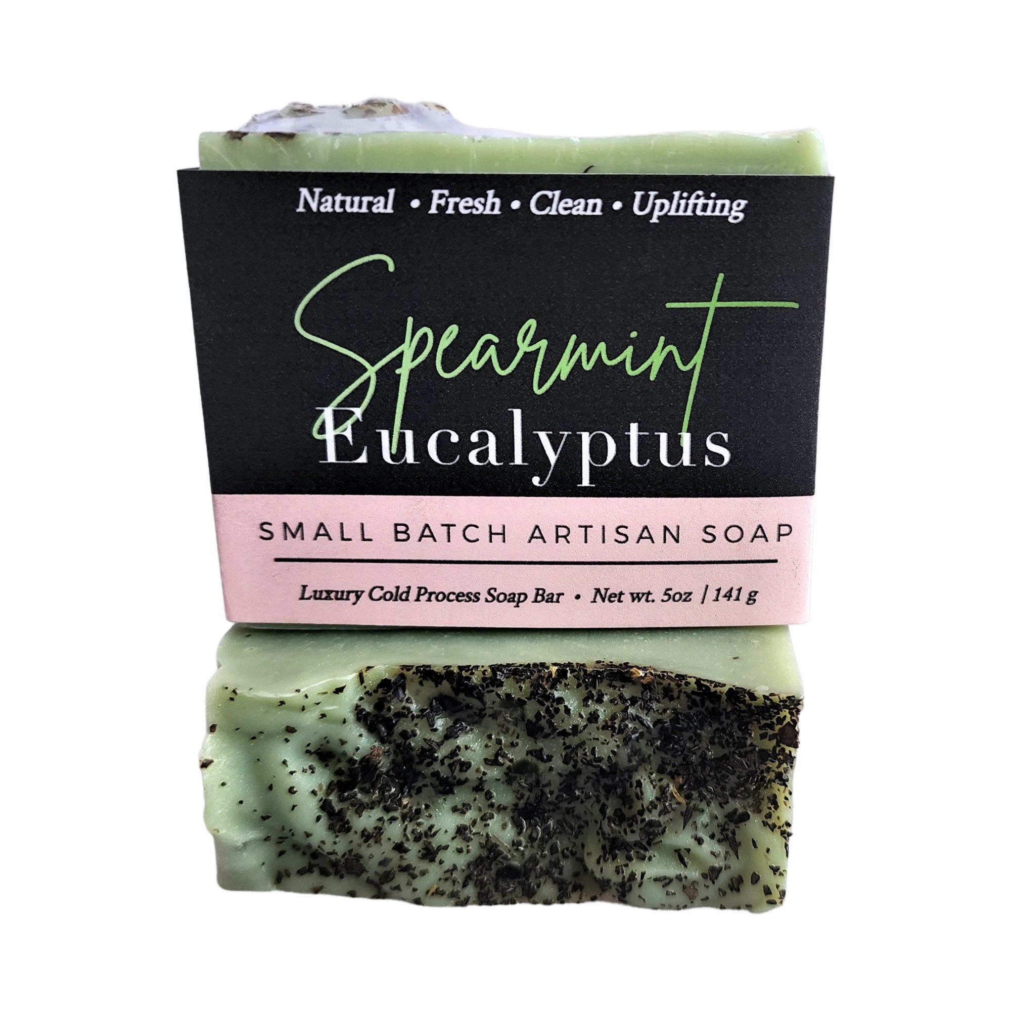 Spearmint Eucalyptus Soap bar with organic mint leaves, showcasing its vibrant green color and creamy texture.