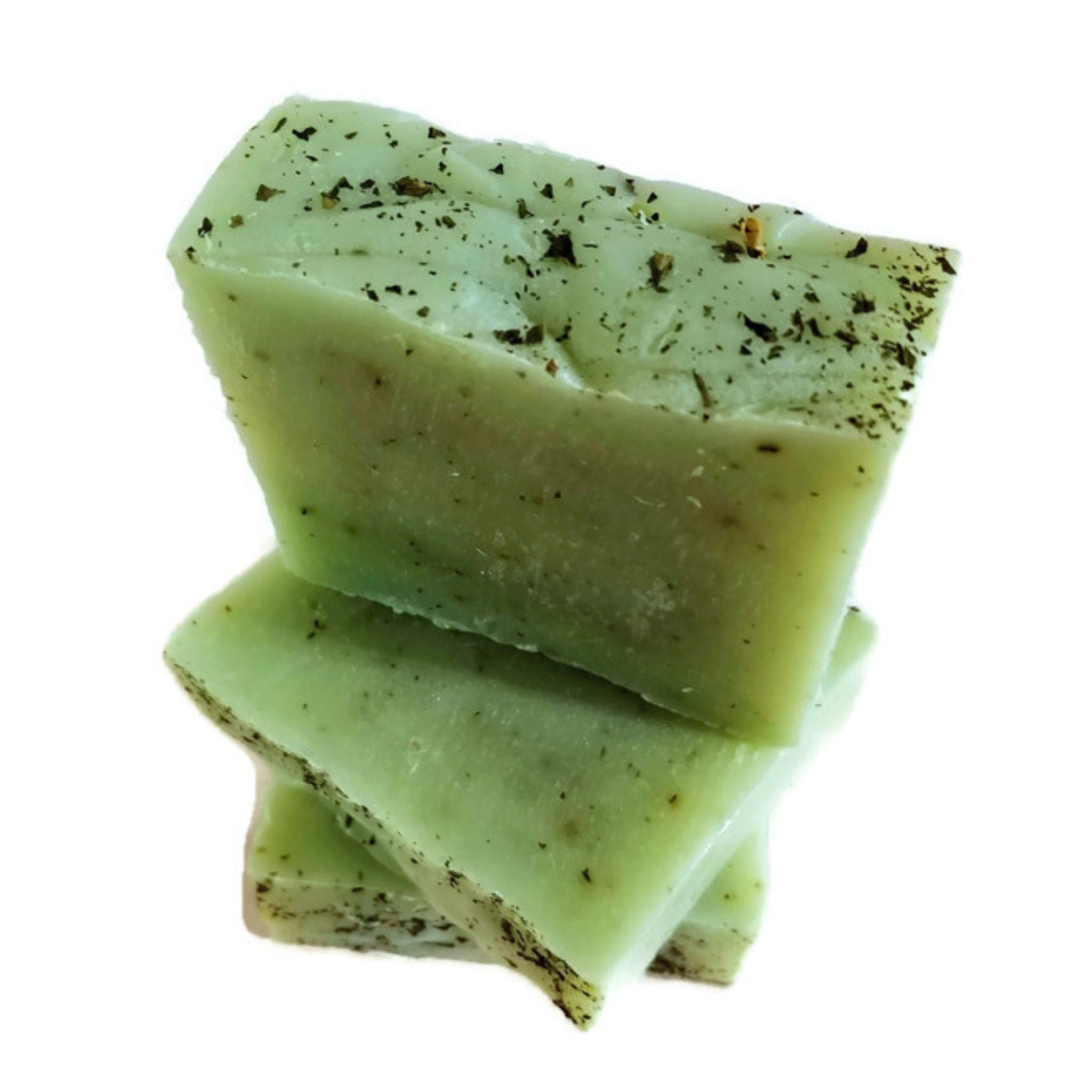 Spearmint Eucalyptus Soap bar with organic mint leaves, showcasing its vibrant green color and creamy texture.