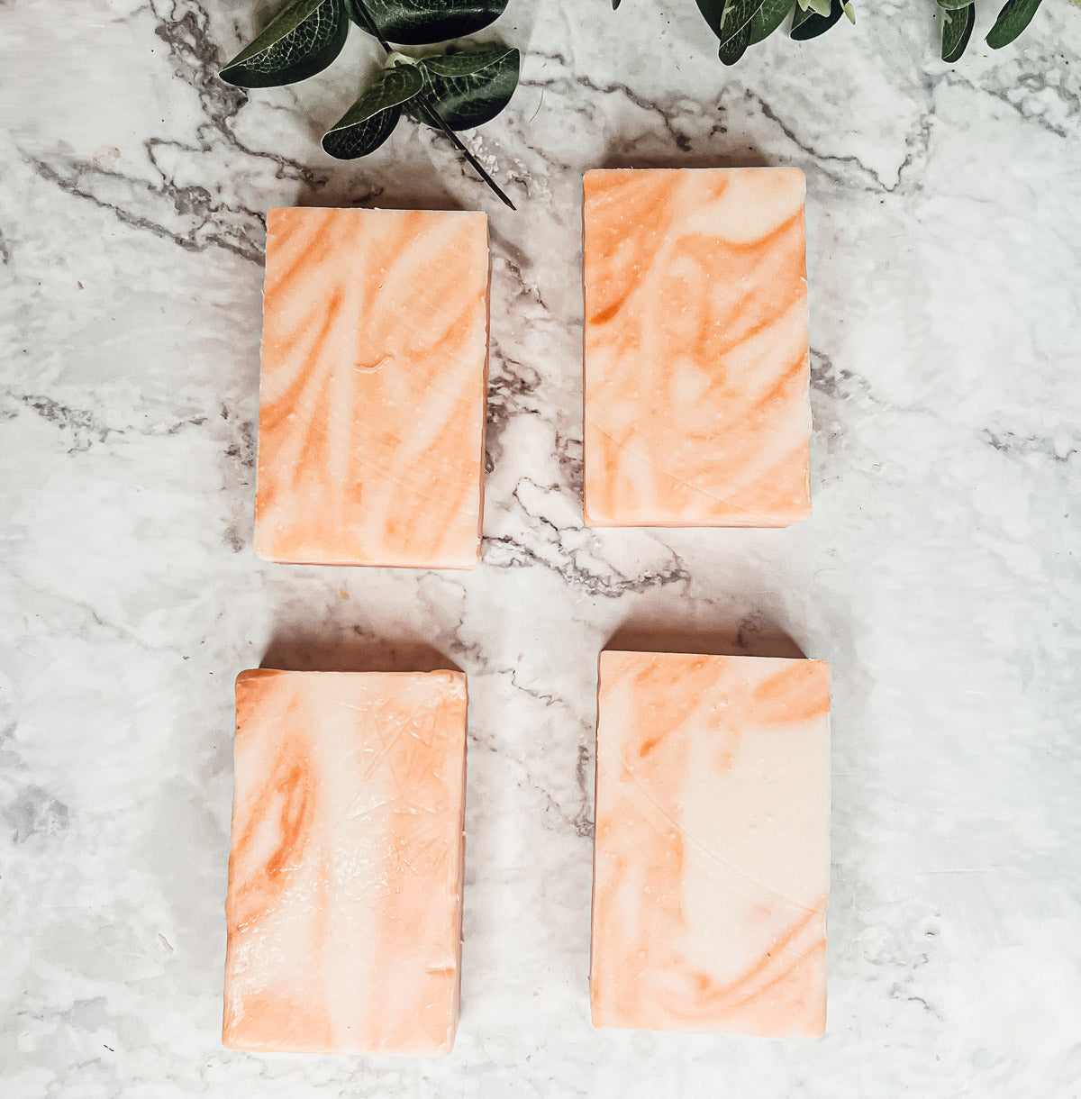 Summertime Citrus soap bar featuring vibrant colors of lime, lemon, and orange, handcrafted with organic ingredients.