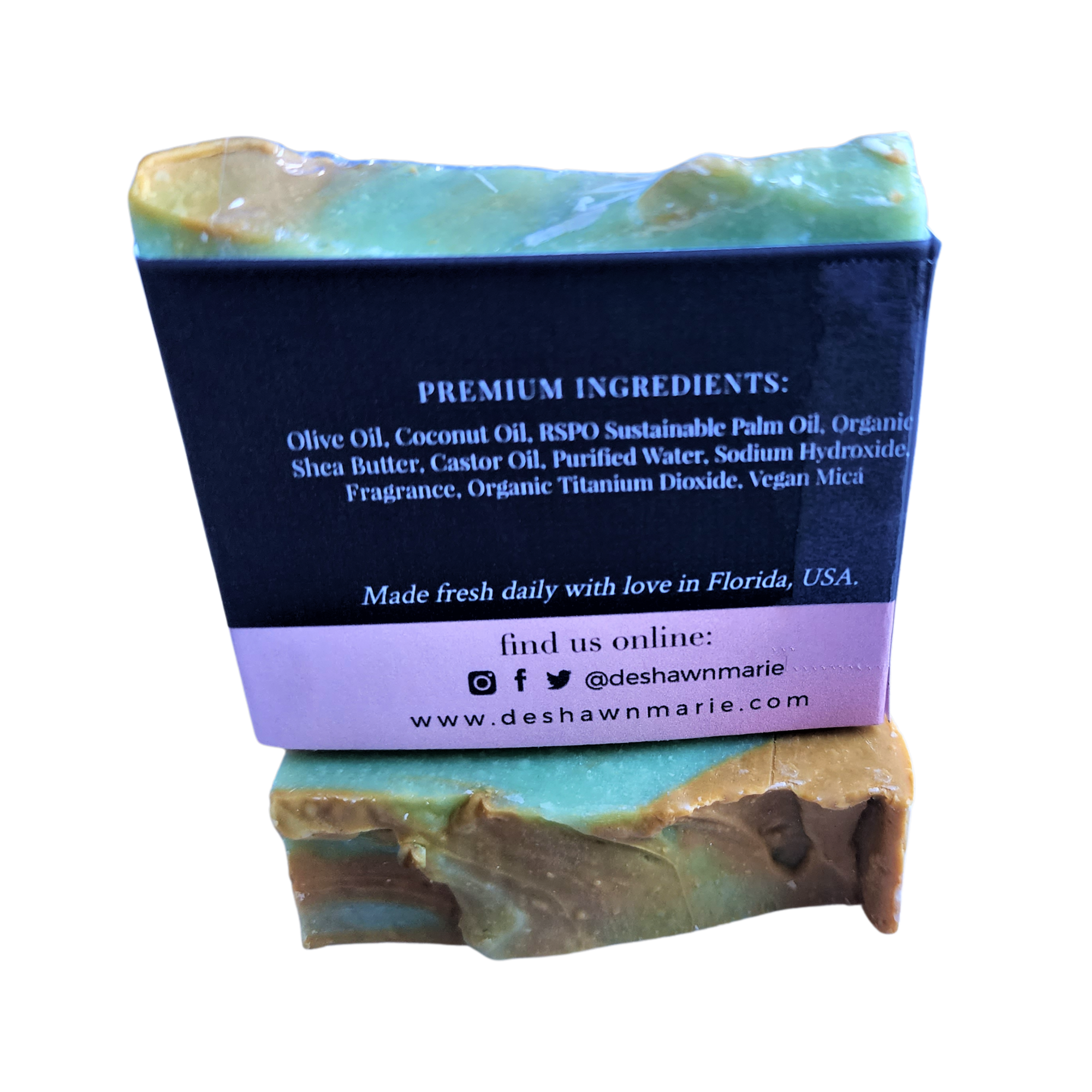 Sunlit Gardenia Soap bar with rich green, muted yellow, and white swirls, showcasing its handcrafted design and vibrant colors.