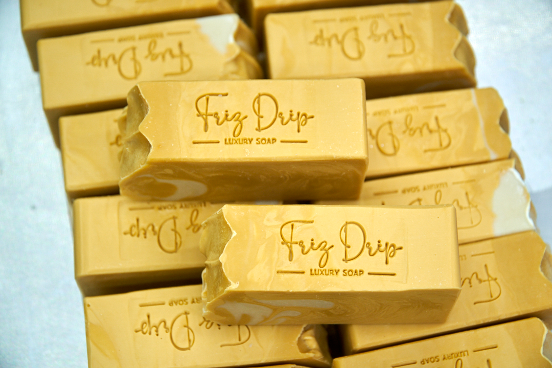 Triple Butter Wonder Soap bar, unscented, featuring a creamy texture and earthy tones, showcasing its natural ingredients.