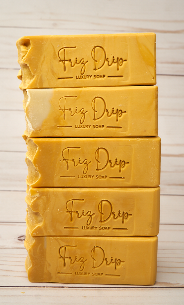 Triple Butter Wonder Soap bar, unscented, featuring a creamy texture and earthy tones, showcasing its natural ingredients.