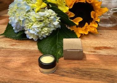 Vegan Refreshing Lip Balm in a sleek tube with a minty flavor, showcasing its natural ingredients.