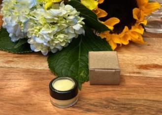 Vegan Refreshing Lip Balm in a sleek tube with a minty flavor, showcasing its natural ingredients.