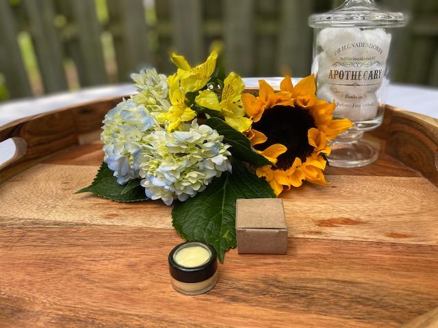 Vegan Refreshing Lip Balm in a sleek tube with a minty flavor, showcasing its natural ingredients.