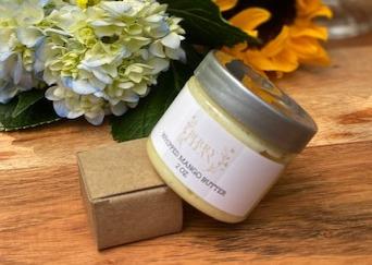 A jar of Vegan Whipped Mango Butter showcasing its creamy texture, ideal for hydrating sensitive skin areas.