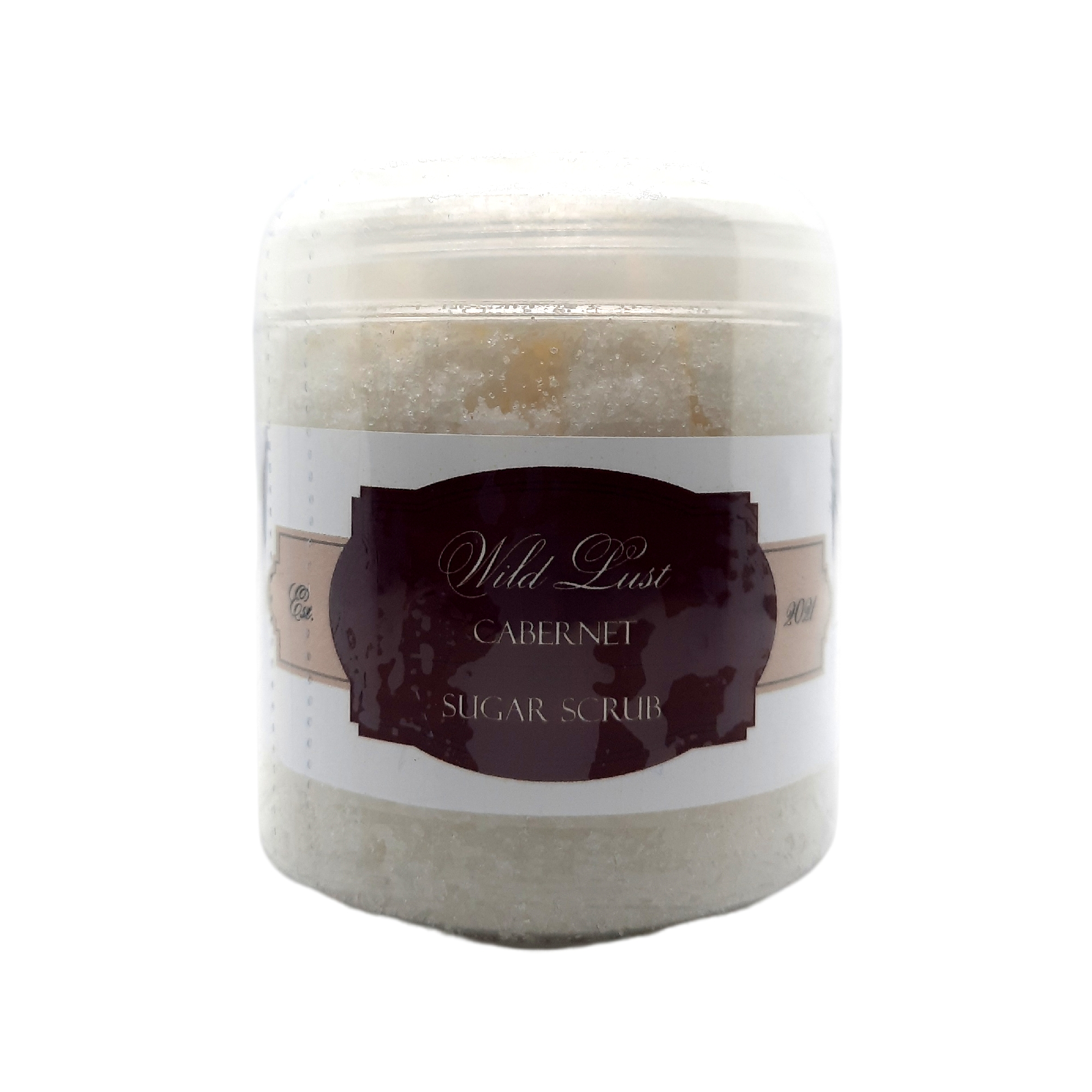 Wild Lust Cabernet Sugar Scrub in a jar, showcasing its rich texture and natural ingredients, with a backdrop of wine grapes and raspberries.