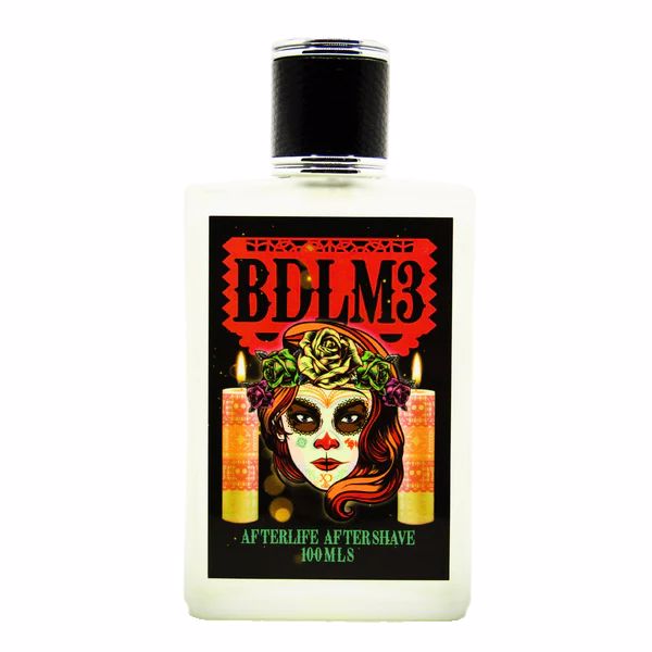 Barbershop de Los Muertos 3 Afterlife Splash bottle featuring vibrant artwork by Xicano Designs, showcasing a female protagonist.