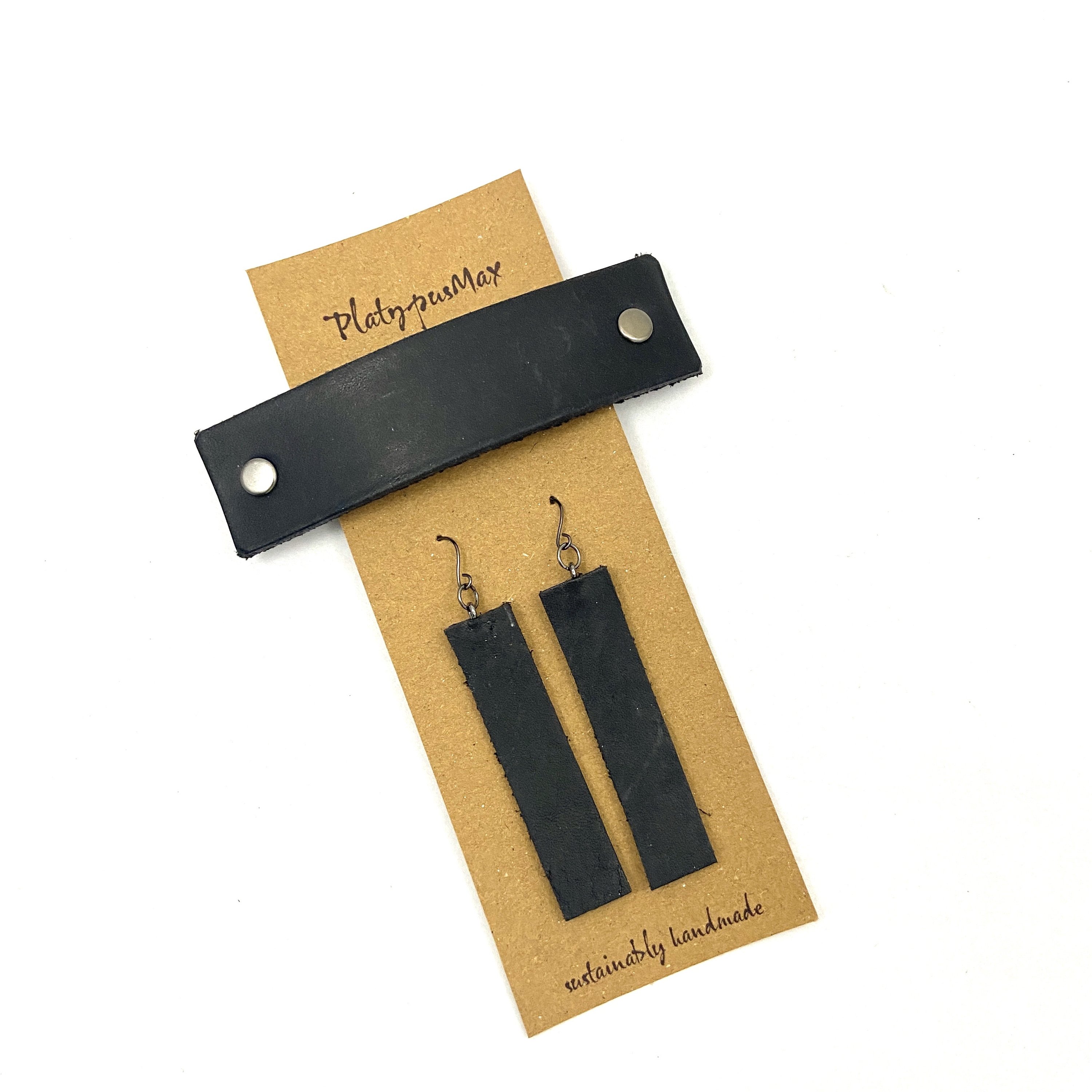 Basic Black Upcycled Leather Barrette and Earring Gift Set featuring dark gunmetal hardware, showcasing sustainable fashion accessories.