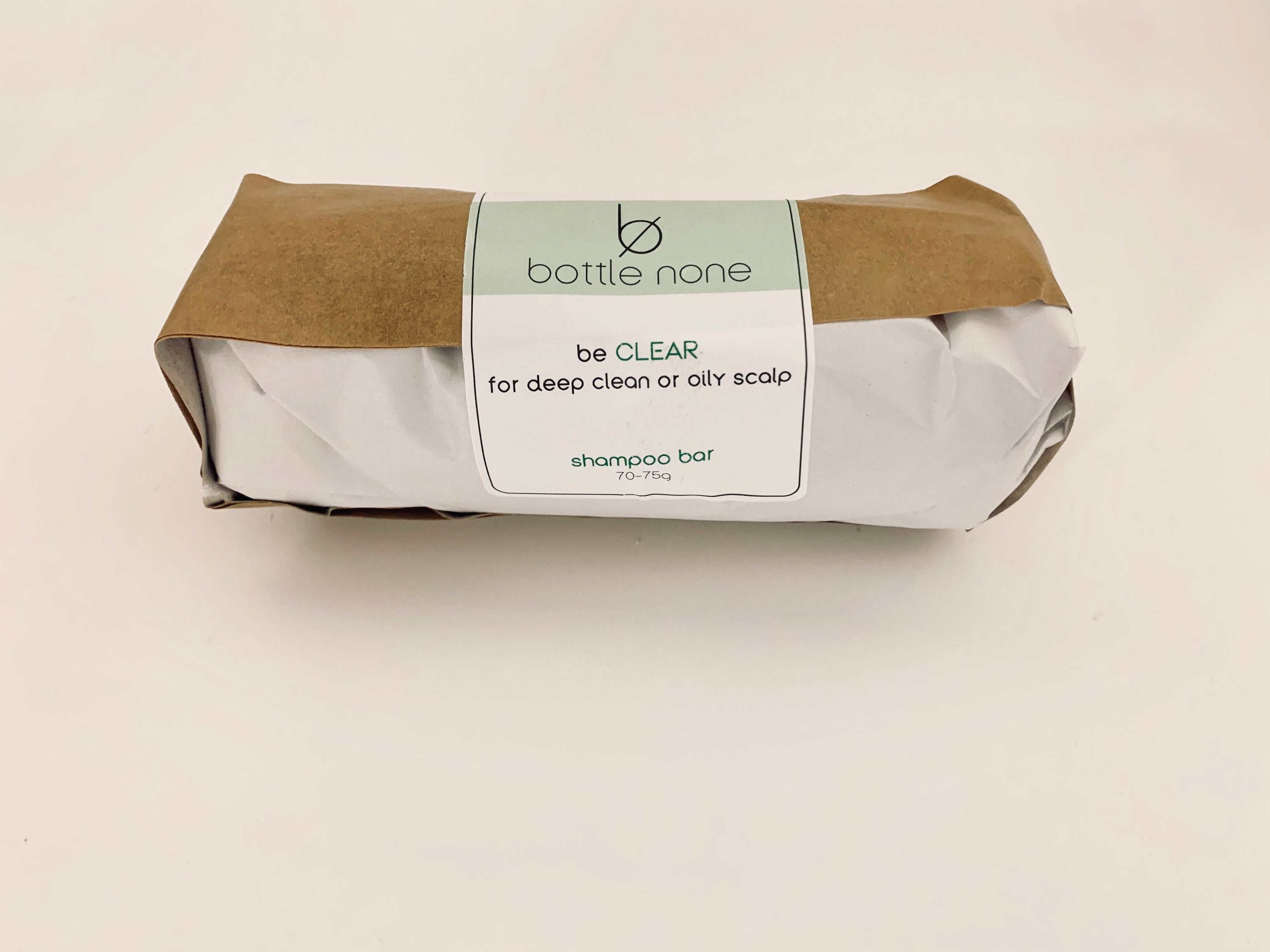 be CLEAR Shampoo Bar CASE containing six bars designed for oily scalps, featuring natural ingredients and eco-friendly packaging.