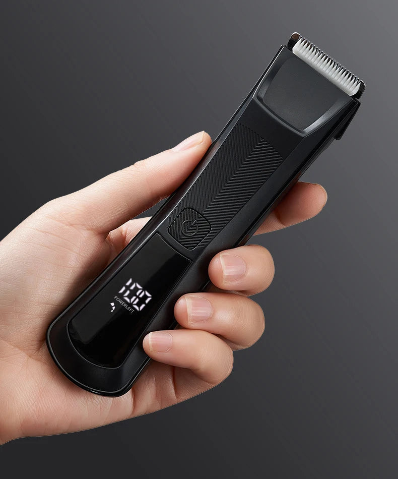 Electric body hair trimmer for men, designed for safe pubic hair removal with a sleek ergonomic design and waterproof features.