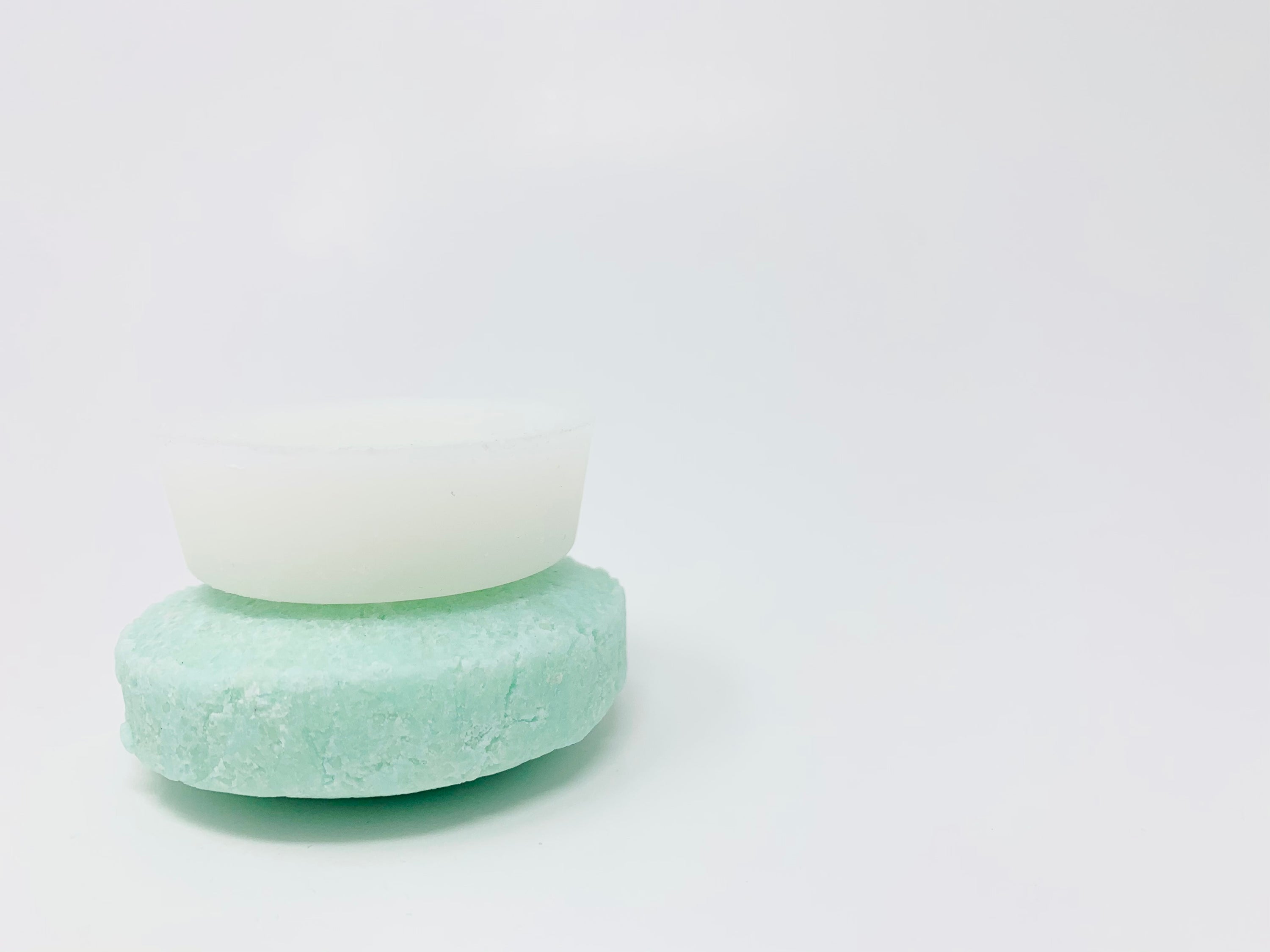 beCLEAR Bundles featuring eco-friendly shampoo and conditioner bars for oily scalp care, packaged in low waste materials.