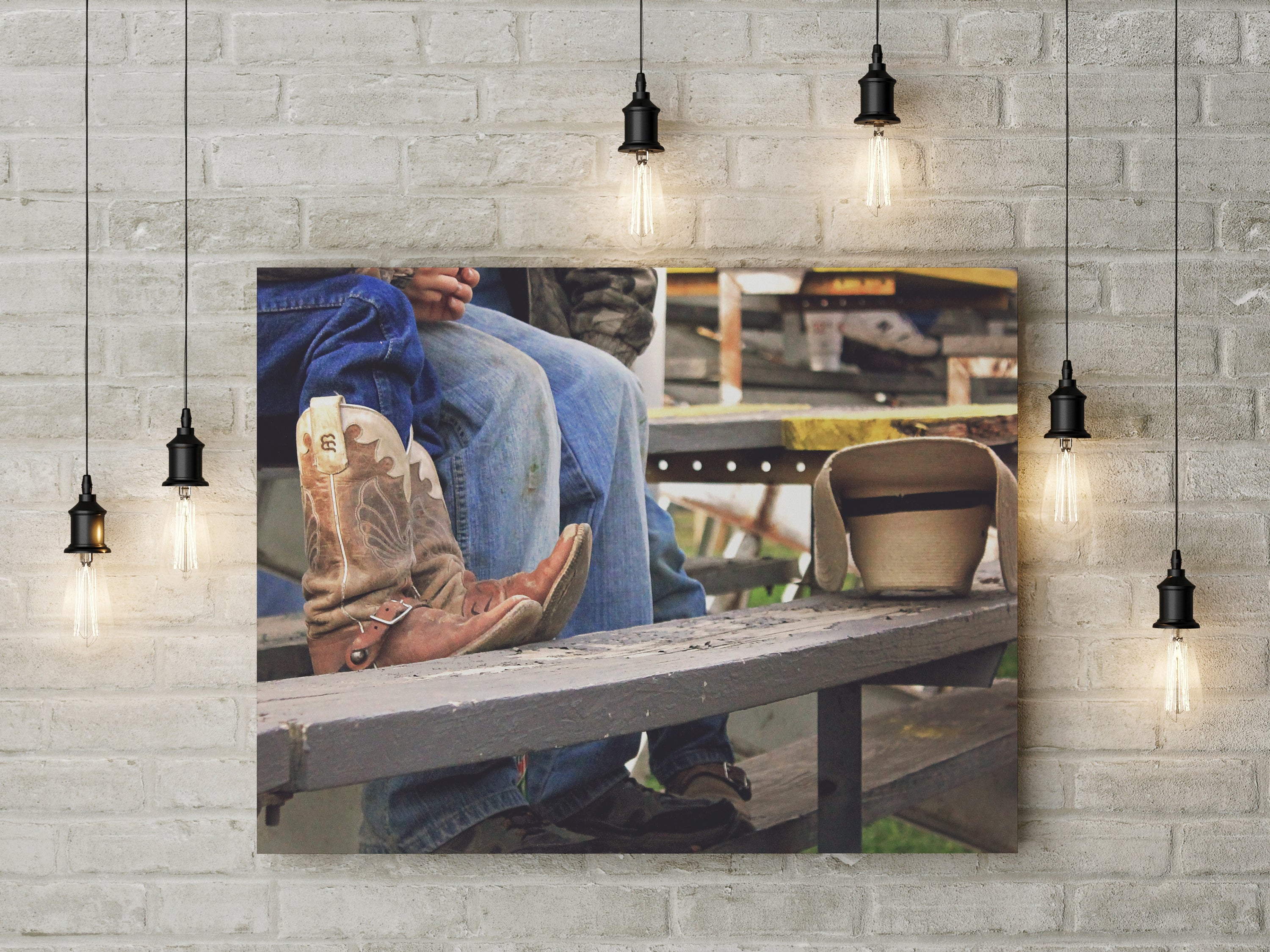 Canvas wall art featuring cowboys in the stands at a rodeo, showcasing vibrant colors and detailed imagery.