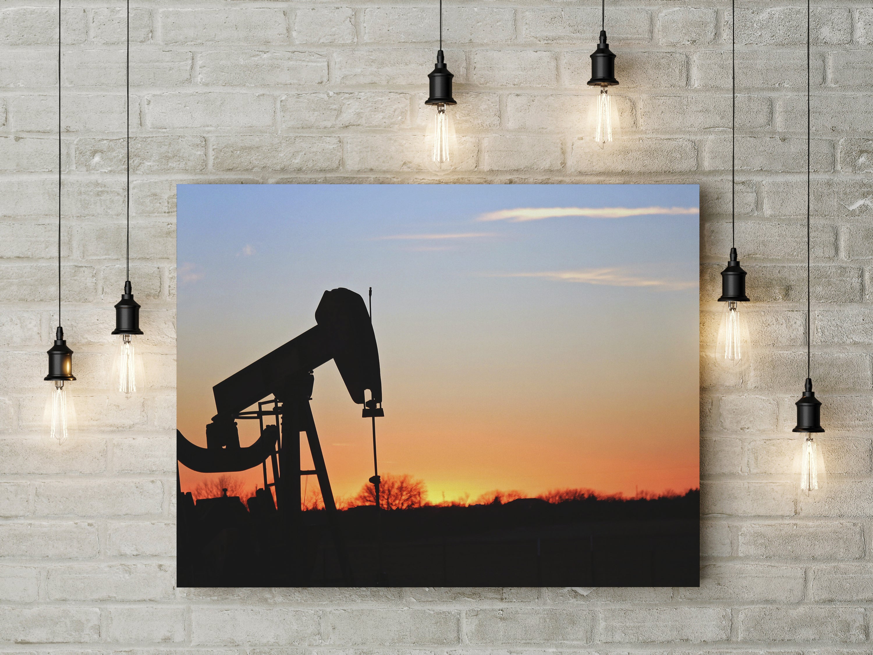 Canvas wall art featuring a striking pumpjack silhouette against a vibrant background.