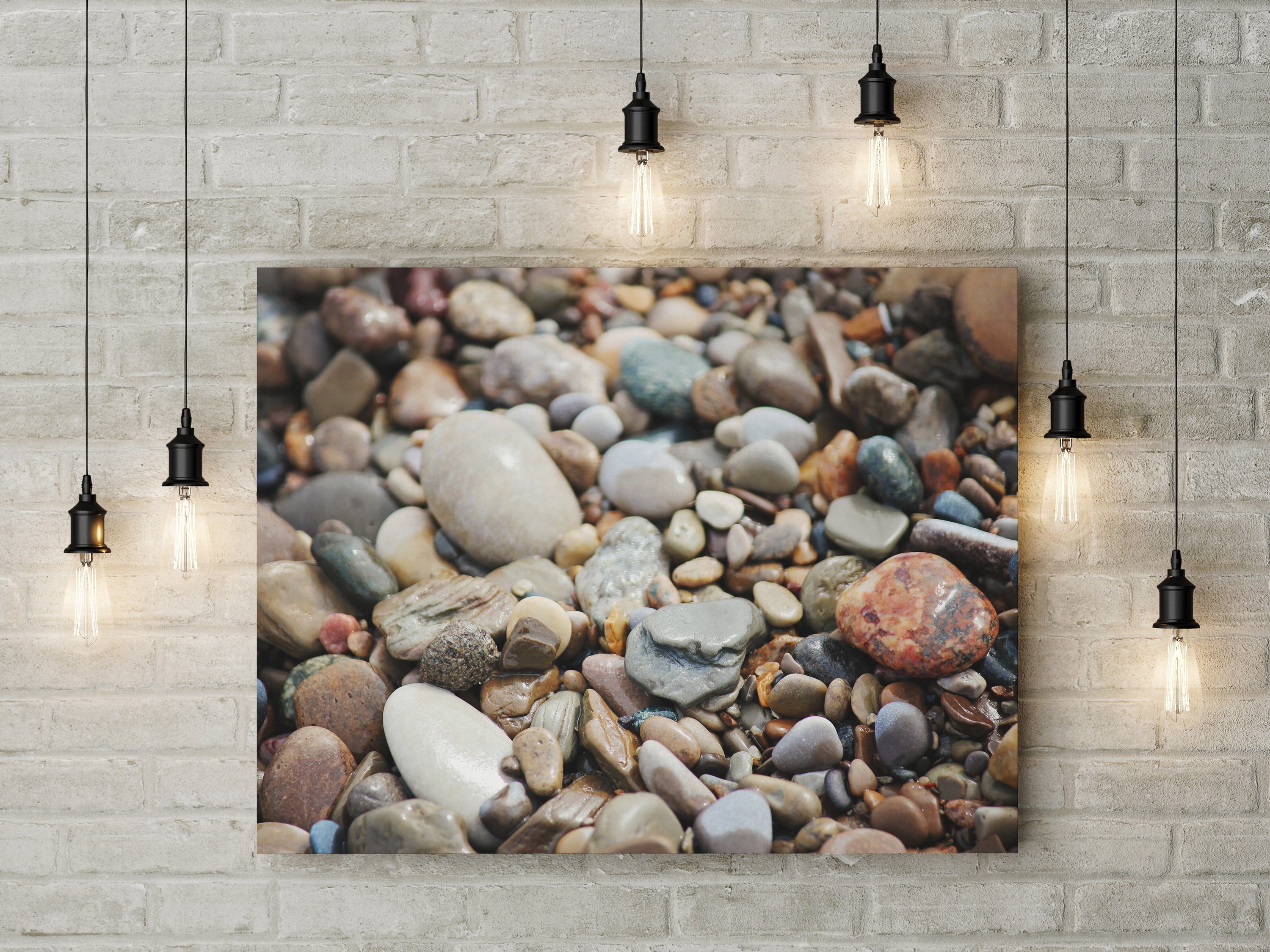 Canvas wall art featuring a serene design of smooth stones, showcasing natural beauty and elegance.