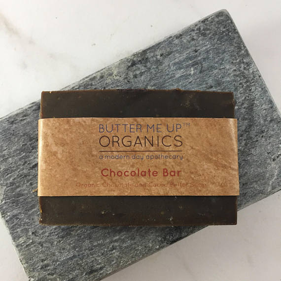 Chocolate All Over Bar, an organic shampoo bar made with cocoa powder, showcasing its rich texture and natural ingredients.