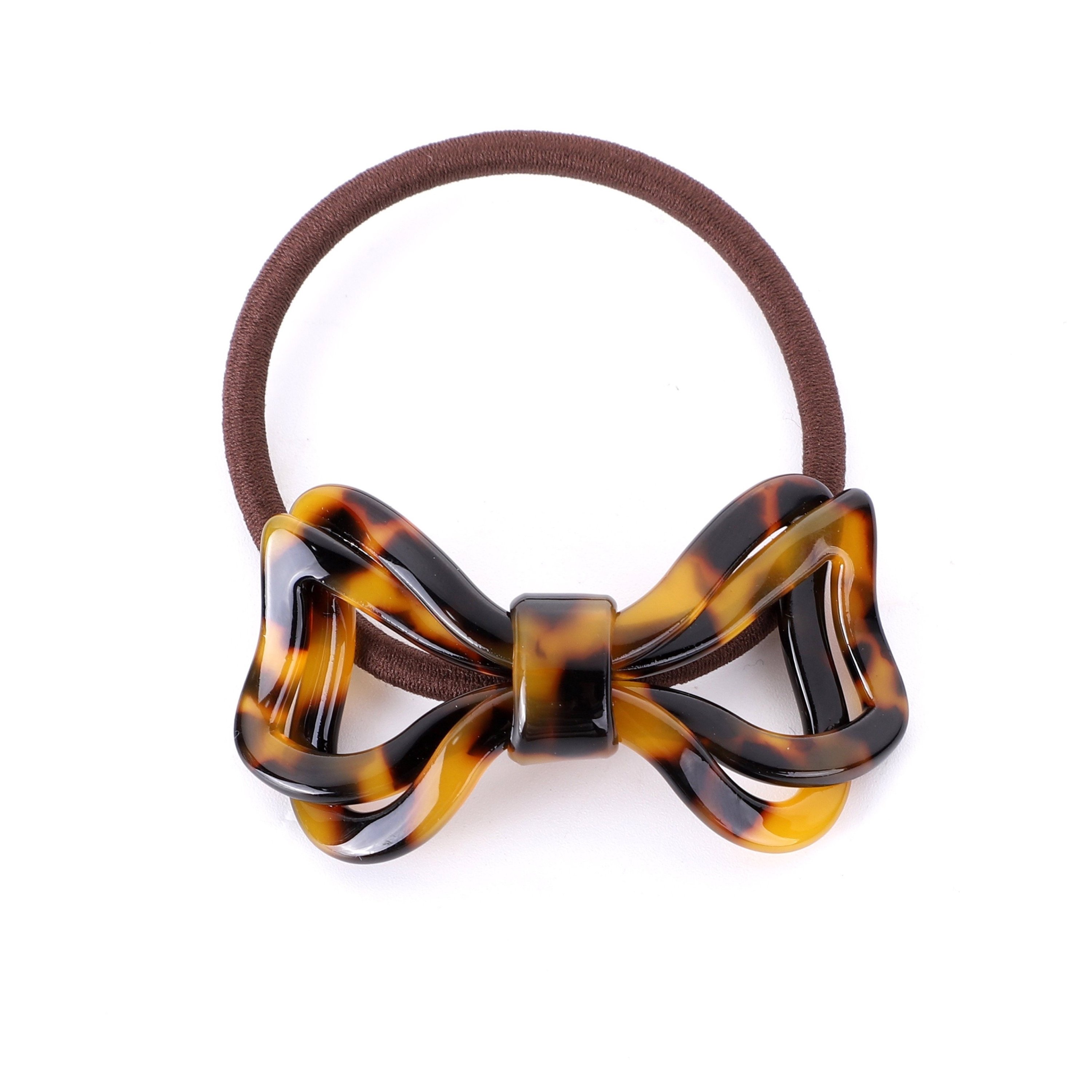 Classic ponytail holder in chocolate brown with a strong grip, designed for all hair types and occasions.