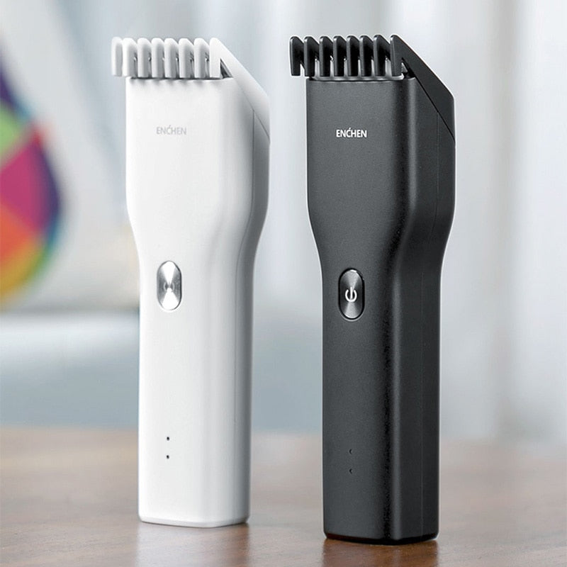 Cordless hair clipper shaver for adults and children, featuring a sleek black and white design with genuine leather accents.