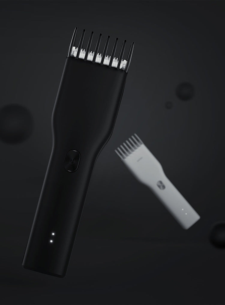 Cordless hair clipper shaver for adults and children, featuring a sleek black and white design with genuine leather accents.