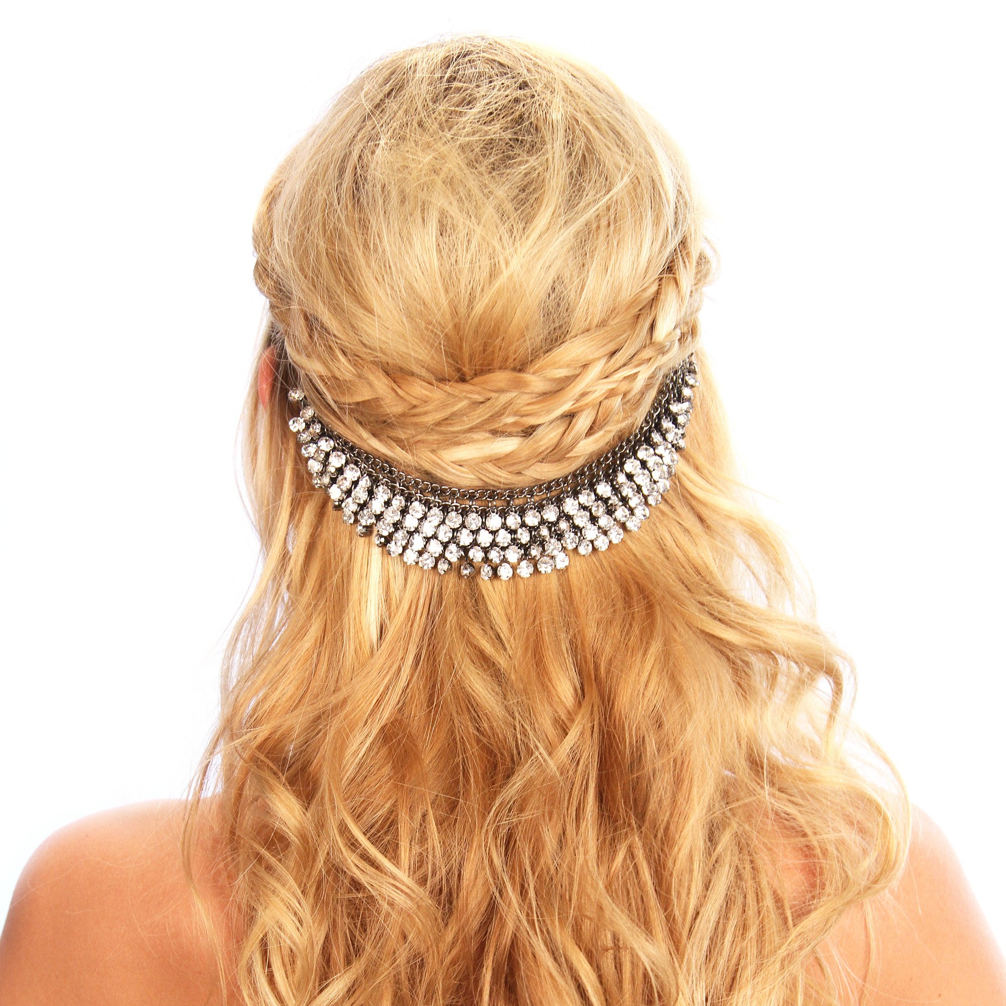 A beautiful Crystal Hair Grip featuring a dark silver tone chain and sparkling glass rhinestones, secured with black metal clamps.