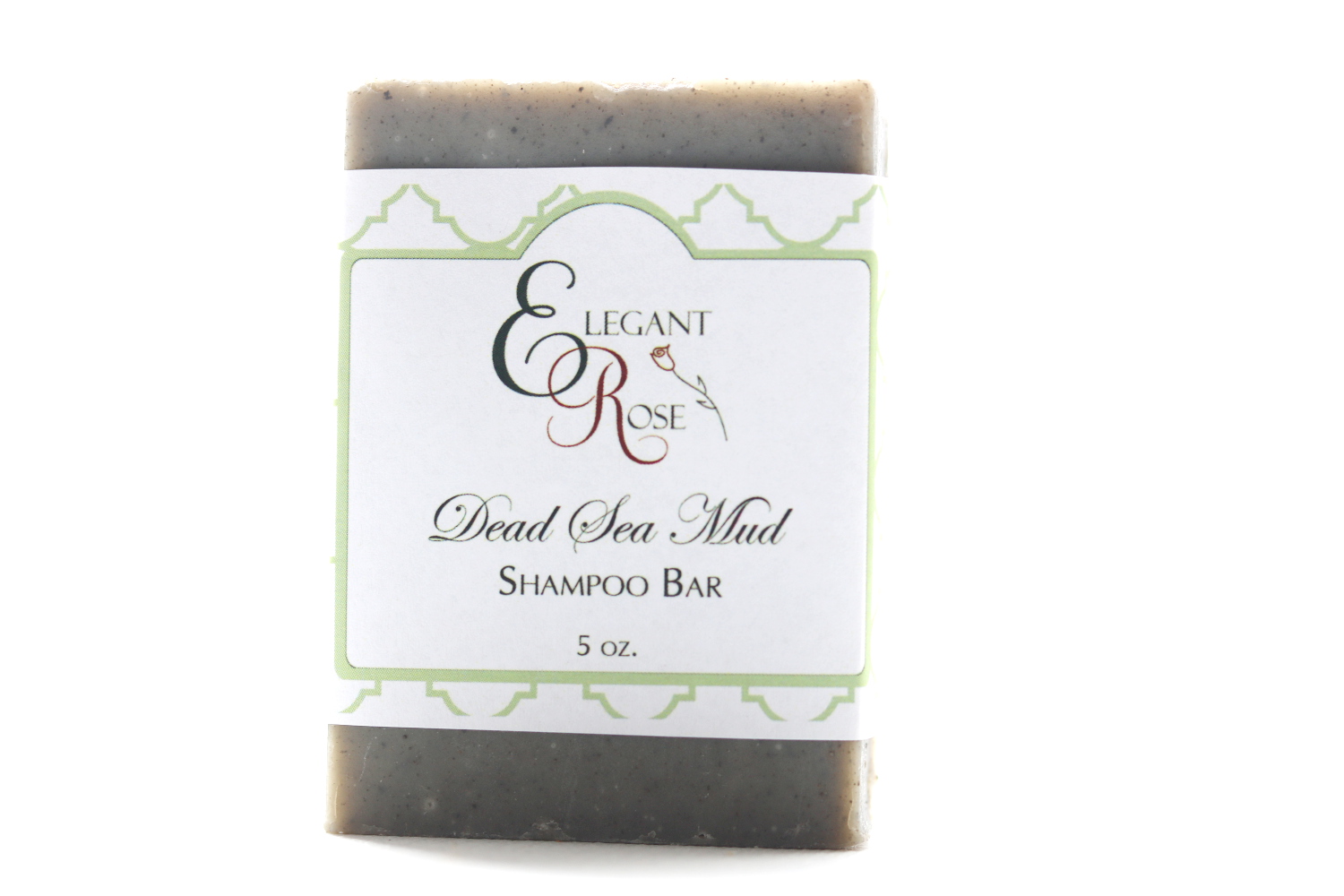 Dead Sea Mud Shampoo Bar with essential oils, showcasing its natural ingredients and earthy texture.