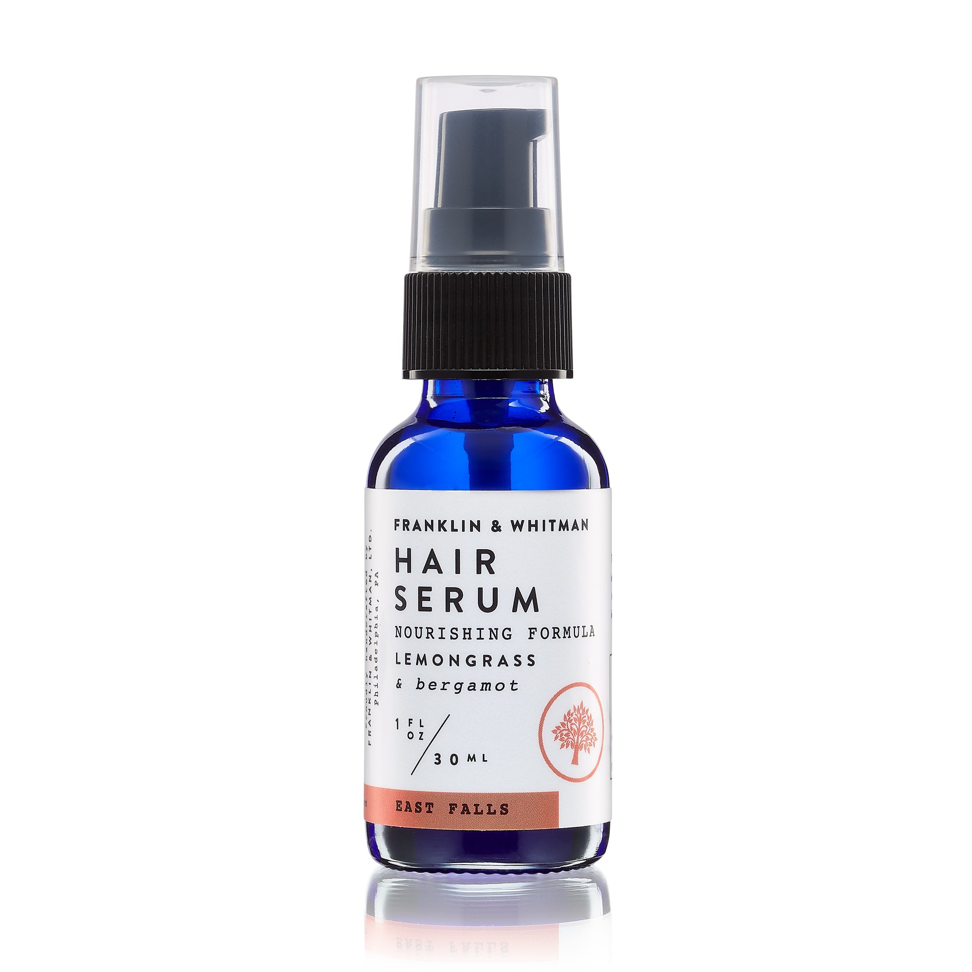 East Falls Hair Serum in a 1oz glass bottle, featuring a blend of natural oils for healthy, shiny hair.