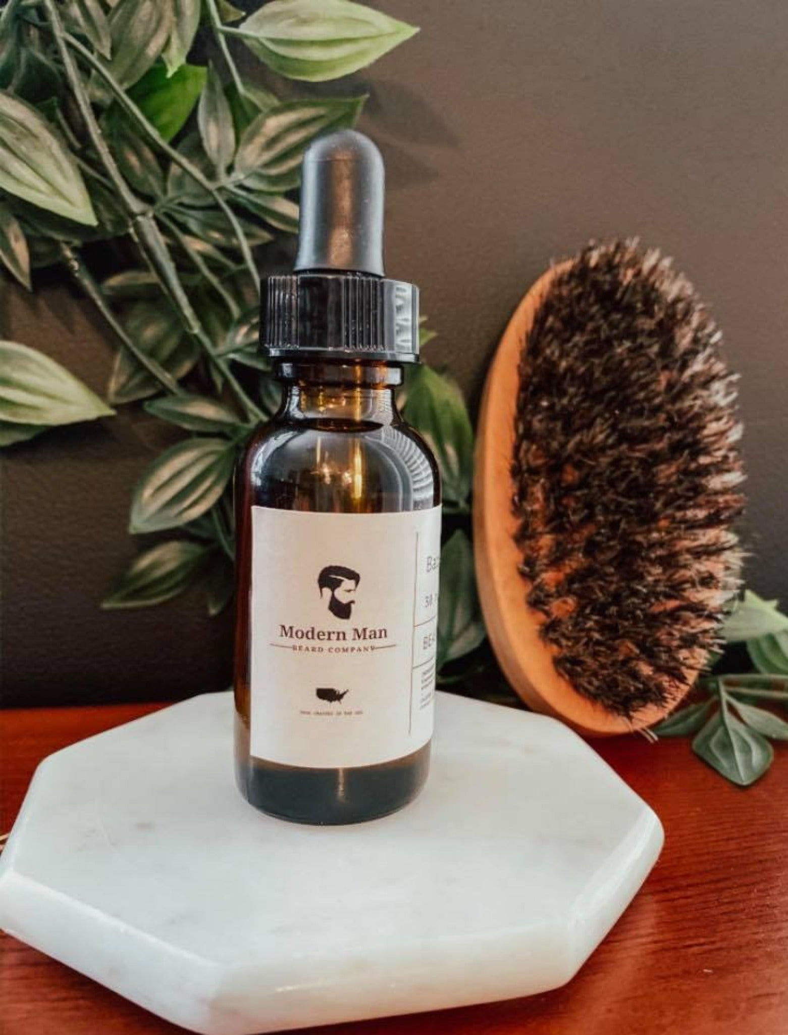 Bottle of Eucalyptus Beard Oil with a woodsy and fresh scent, designed for softening and grooming beards.