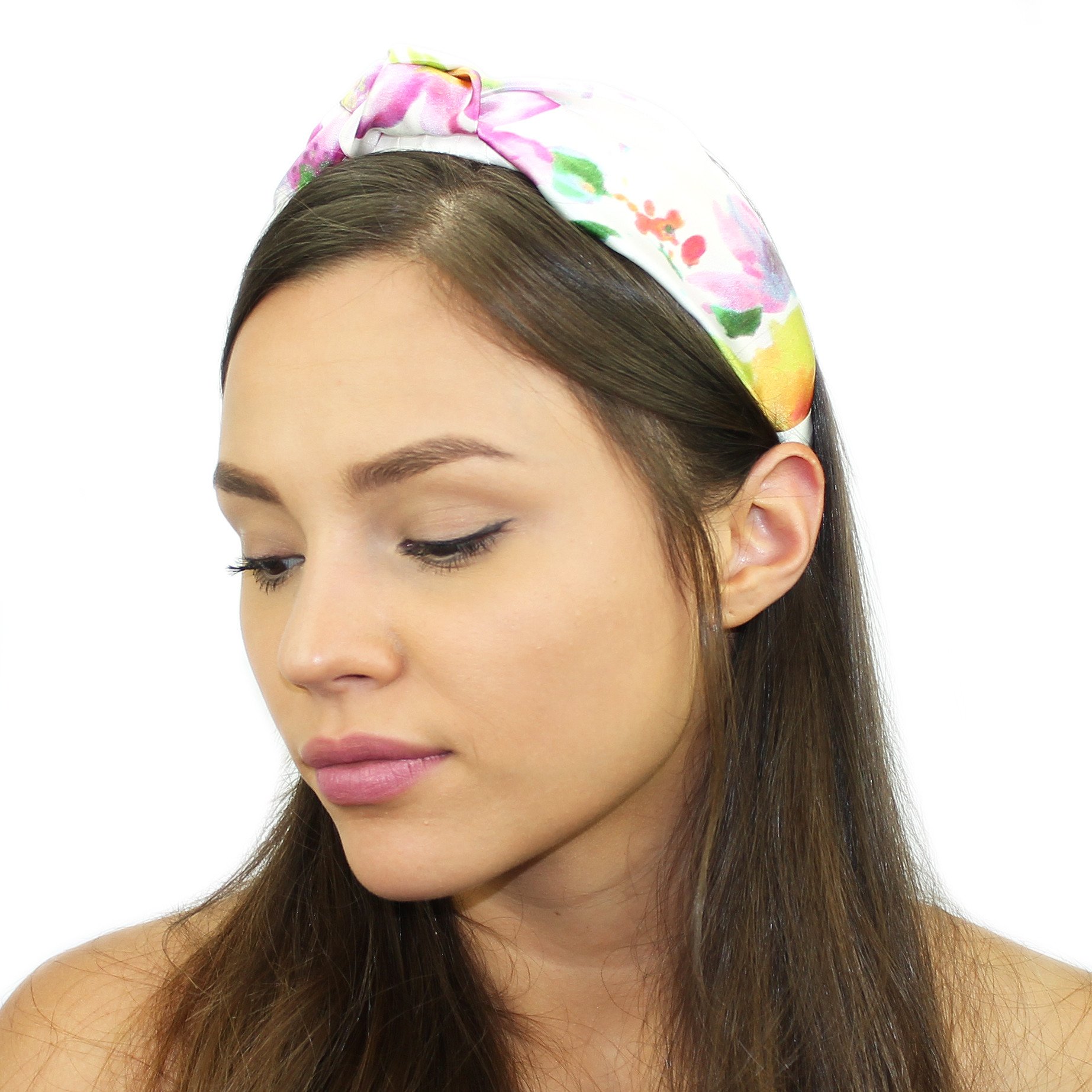 Floral Silk Top Knot Headband featuring a vibrant floral pattern and padded design for comfort, made from 100% silk.