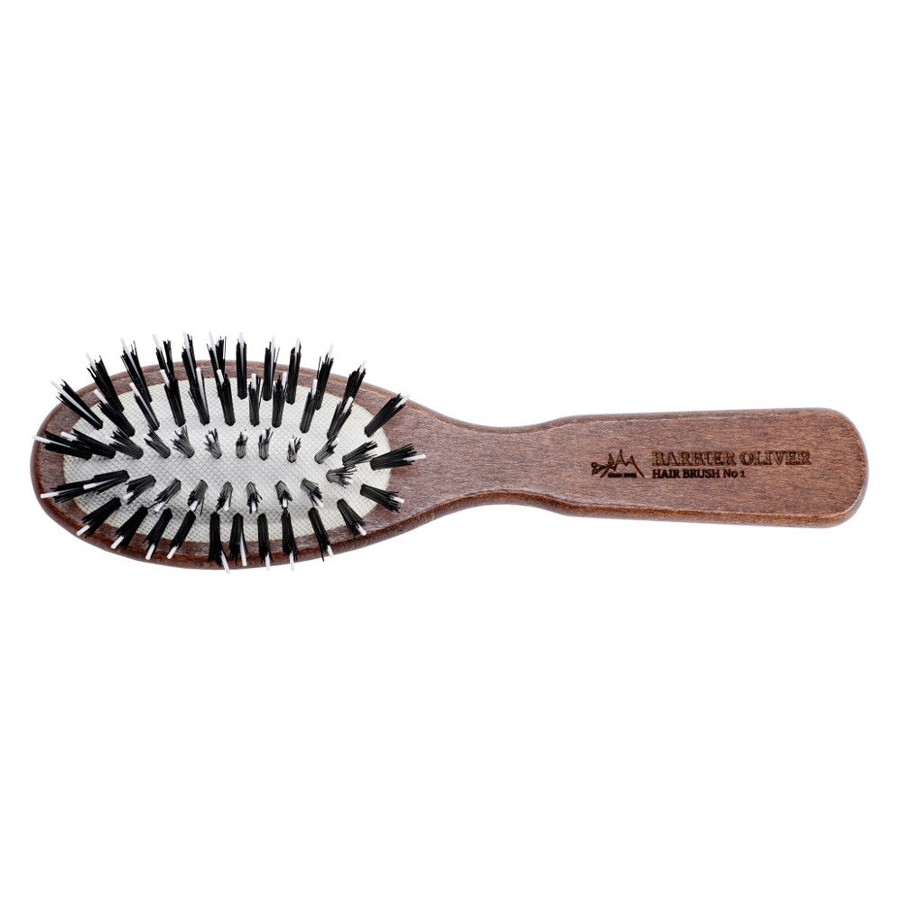 Hair Brush No. 01, a small wooden detangling brush designed for smooth hair, ideal for travel and children.