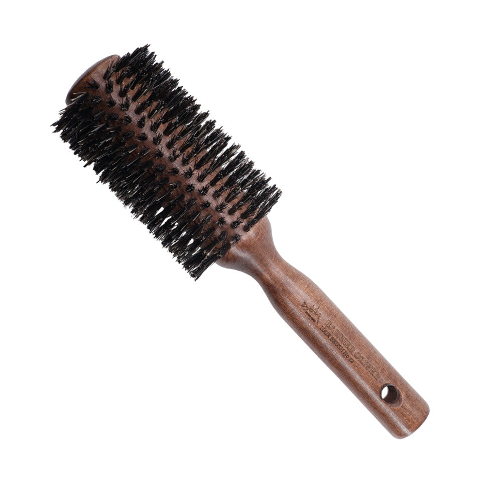 Hair Brush No. 12 featuring natural boar bristles and a 60mm round design, perfect for professional and everyday hair styling.