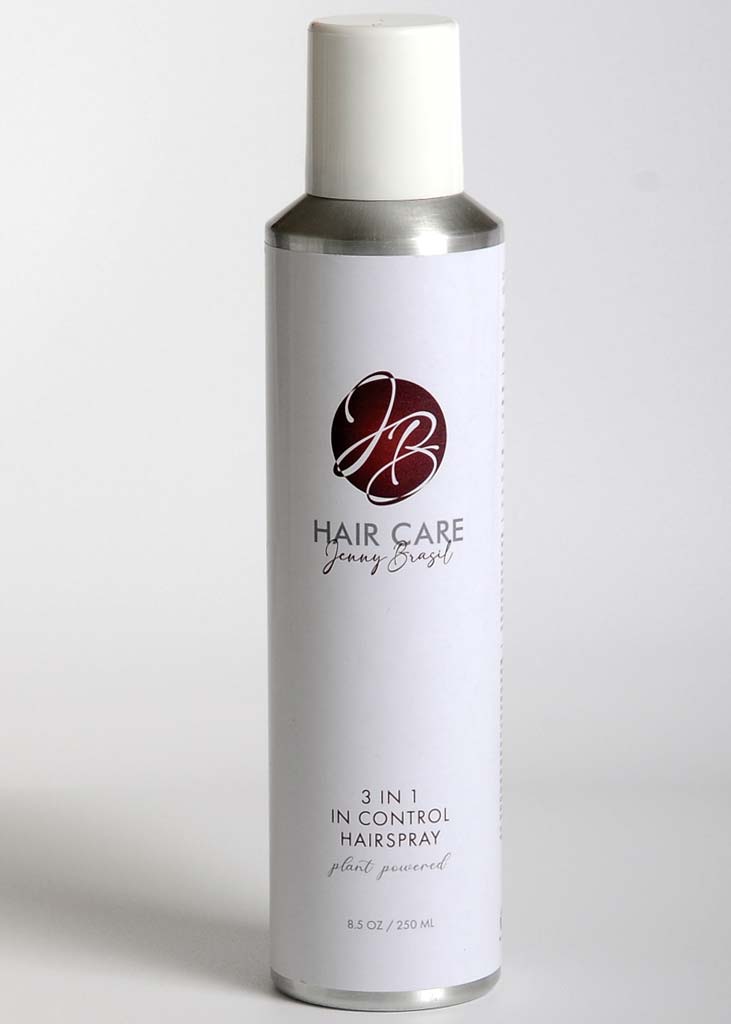 A bottle of IN CONTROL HAIRSPRAY showcasing its sleek design and adjustable nozzle for customizable hold.