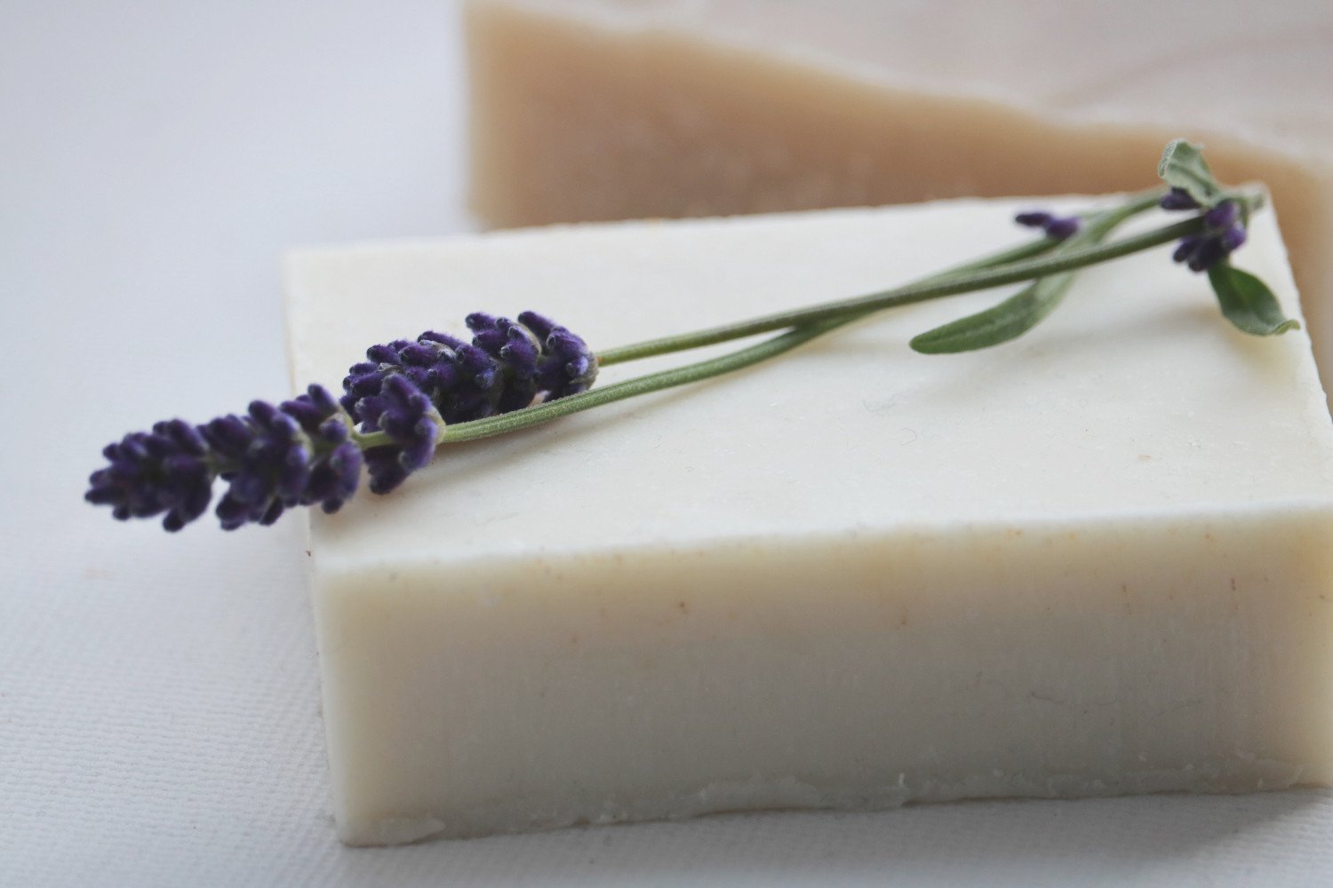 Lavender Chamomile Shampoo Bar with natural ingredients, showcasing its solid form and vibrant colors, ideal for hair care.