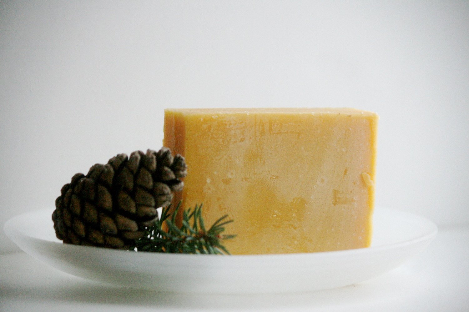 Lavender Cypress Shampoo Bar with a fresh herbaceous scent, featuring natural ingredients like lavender and cypress essential oils, displayed on a wooden surface.